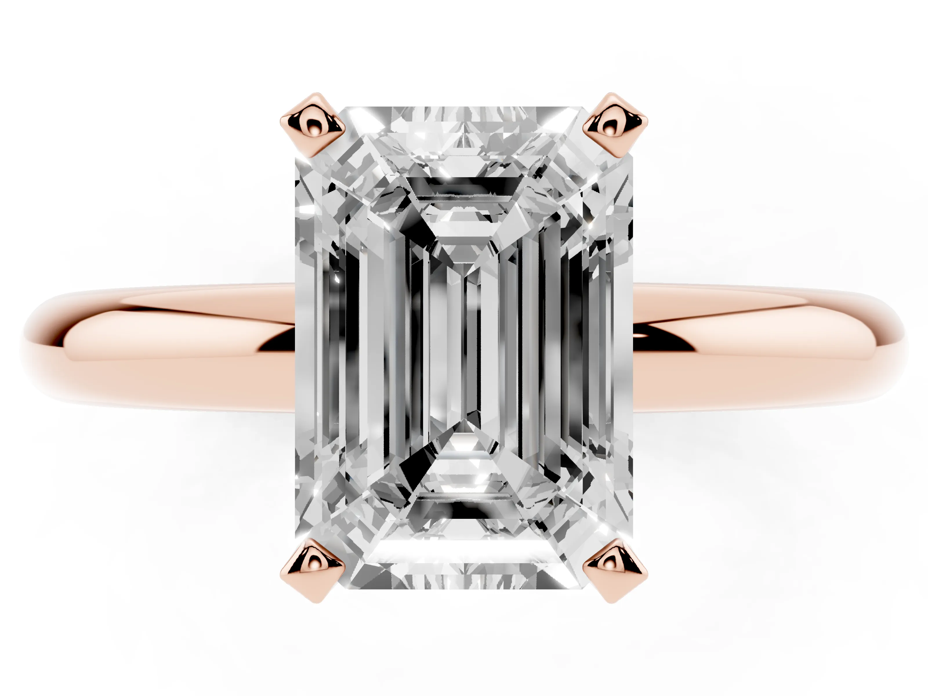 Emerald Cut Diamond Solitaire Engagement Ring Set in Rose gold with Round Band and Prong Setting