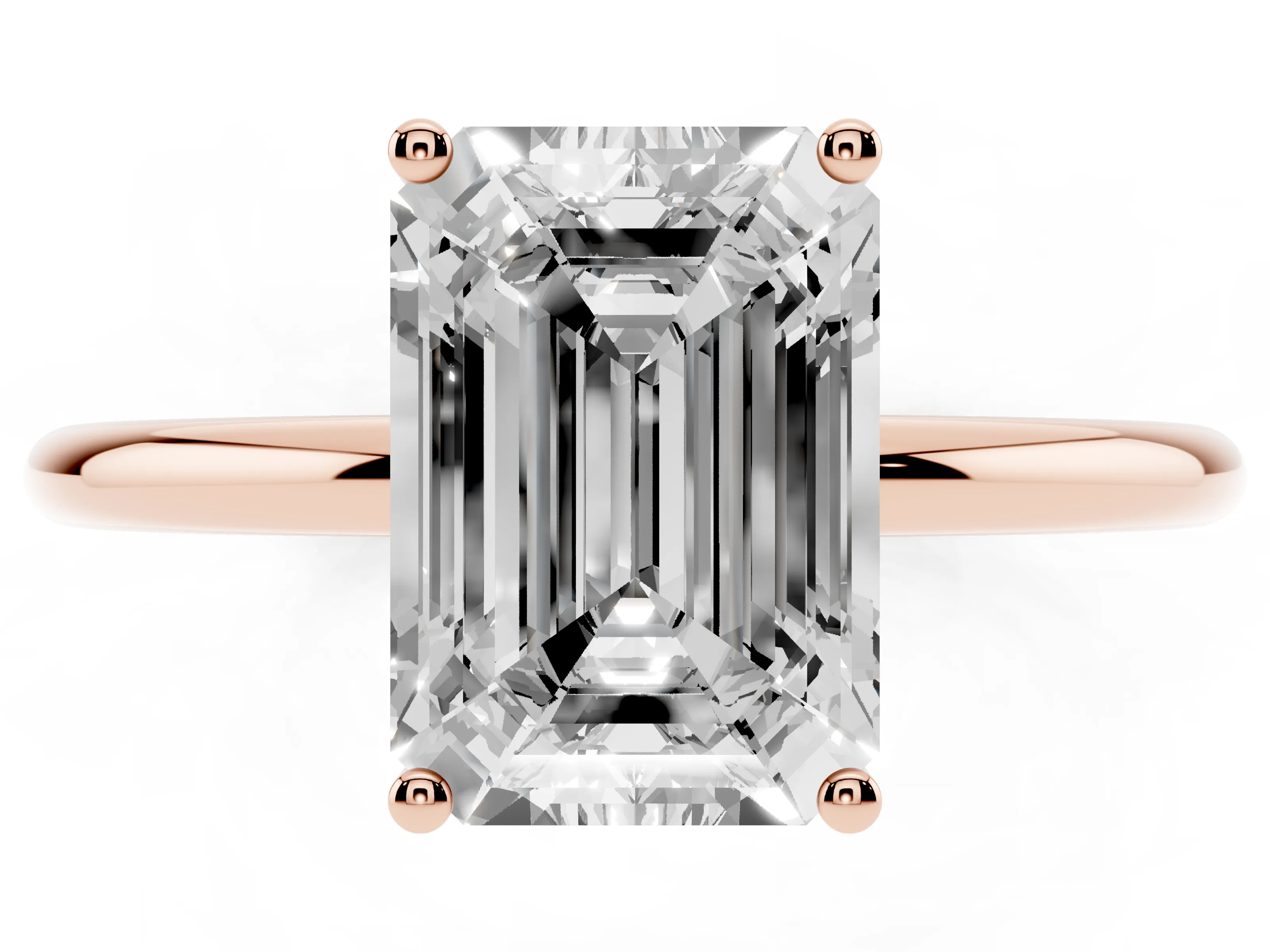 Emerald Cut Diamond Solitaire Engagement Ring Set in Rose gold with Thin Band and Prong Setting