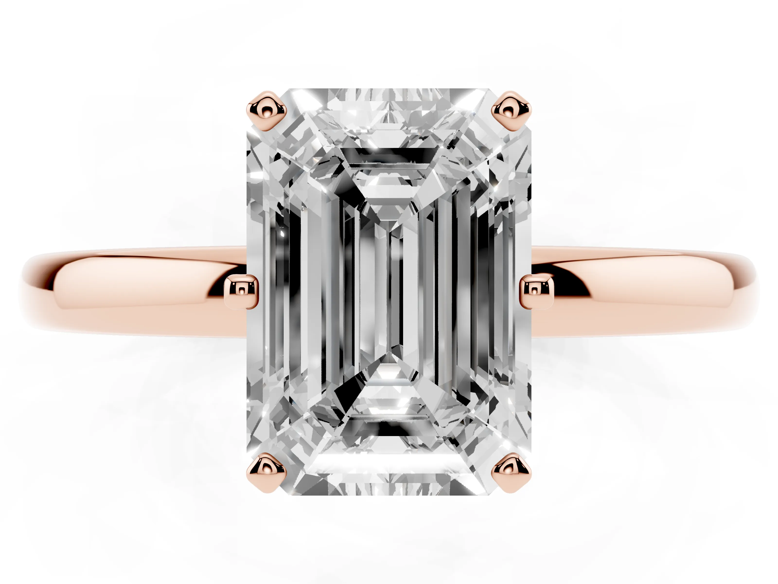 Emerald Cut Diamond Solitaire Ring Set in Rose gold with Raised Prong Setting on a Classic Band