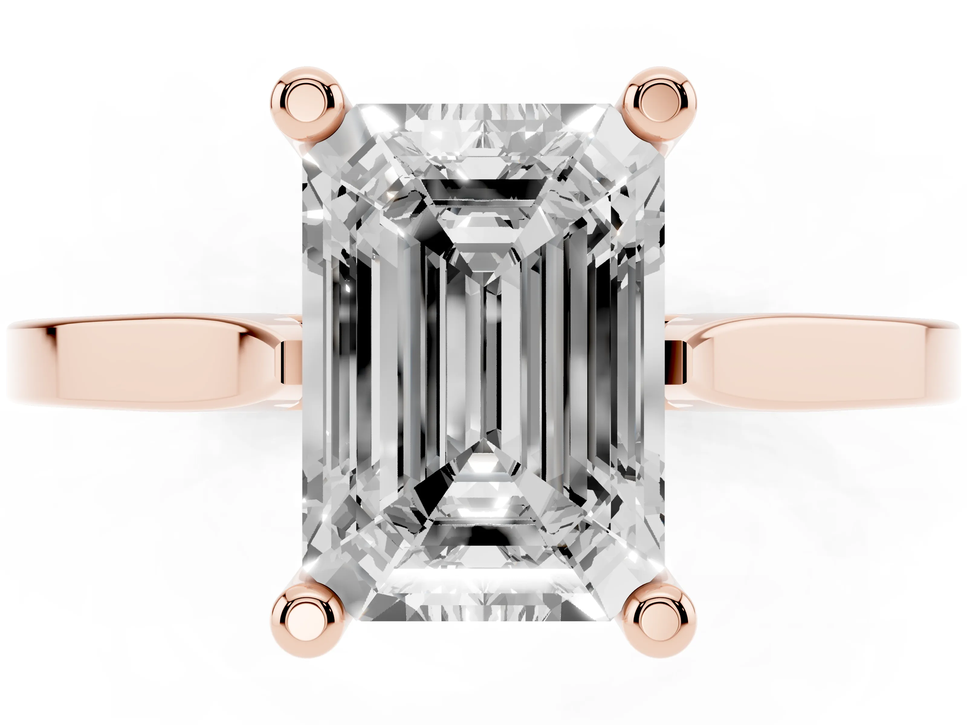 Emerald Cut Diamond Solitaire Ring Set in Rose gold with Prong Setting and Tapered Band