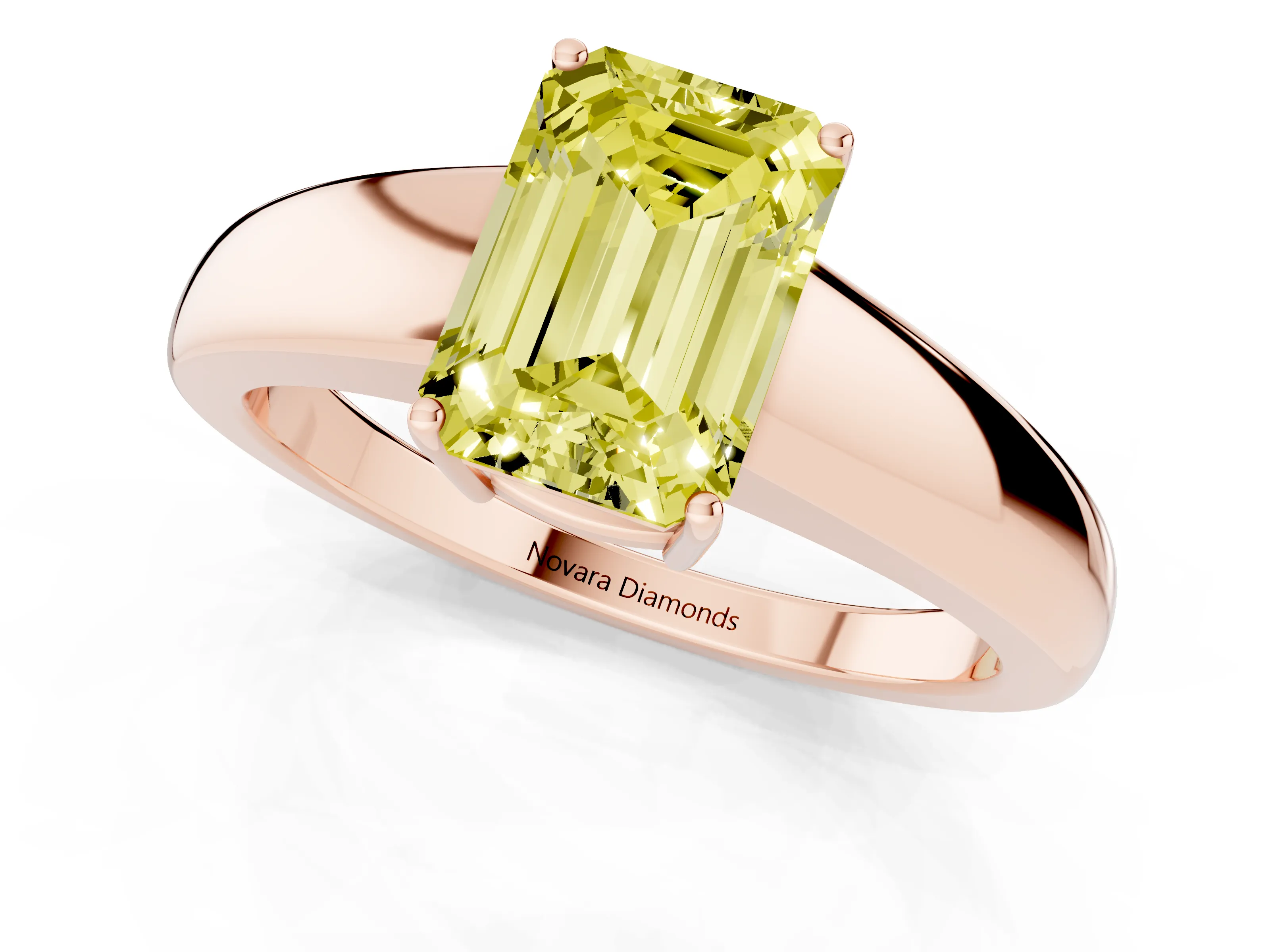 Fancy Yellow Emerald Cut Diamond Solitaire Ring Set in Rose gold with Tapered Band and Prong Setting