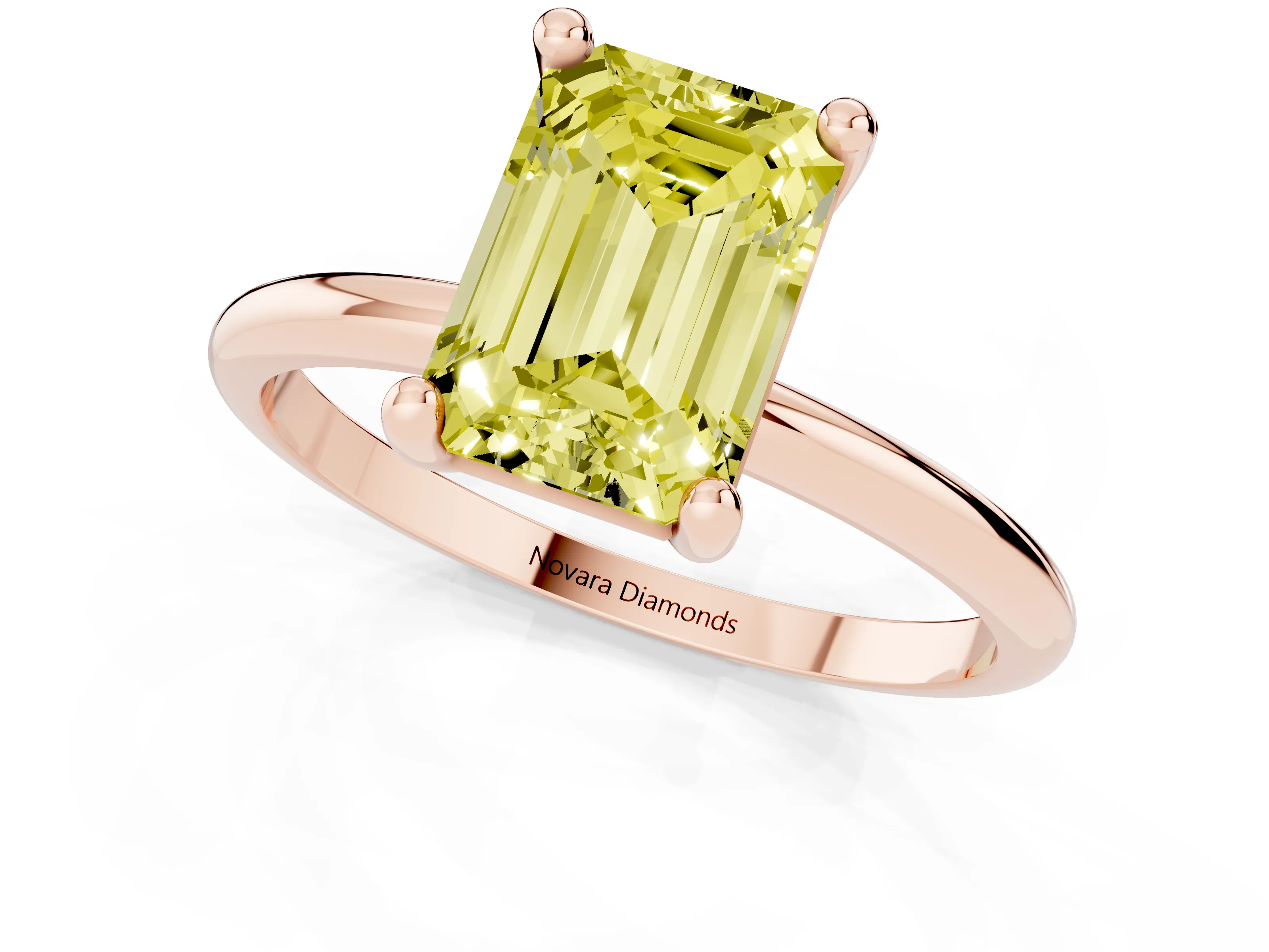 Fancy Yellow Emerald Cut Diamond Solitaire Ring Set in Rose gold with Secure Prong Setting on a Classic Band