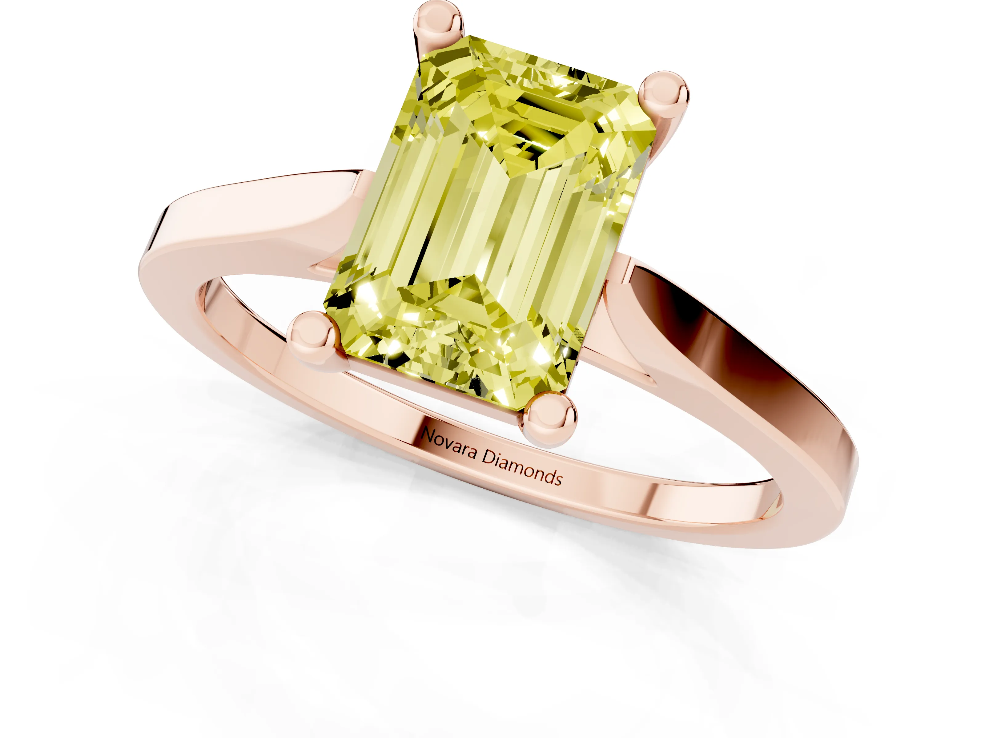 Fancy Yellow Emerald Cut Diamond Solitaire Ring Set in Rose gold with Prong Setting and Tapered Band