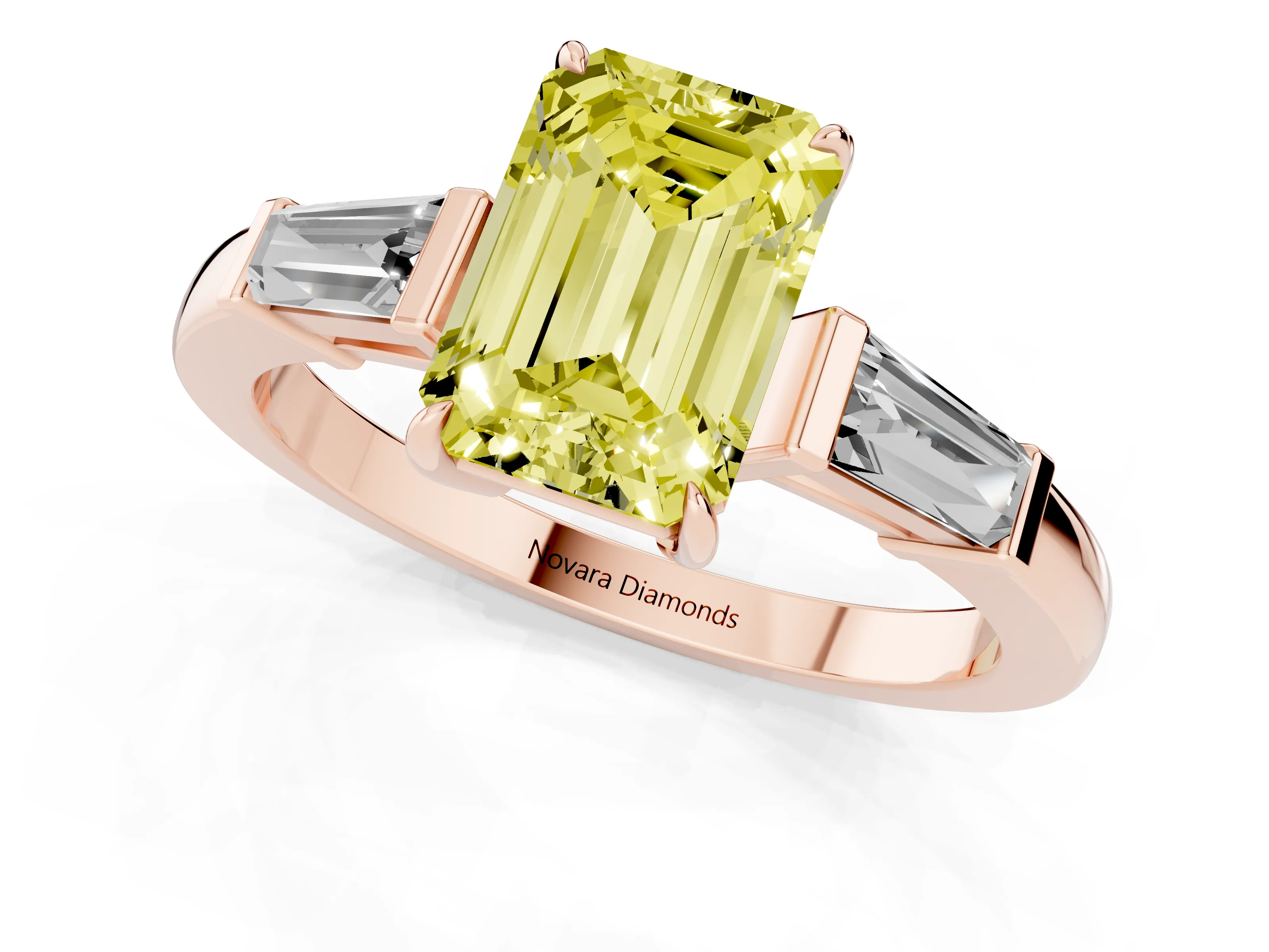 Fancy Yellow Emerald Cut Diamond Three-Stone Ring Set in Rose gold with Tapered Baguette Side Stones and Prong Setting
