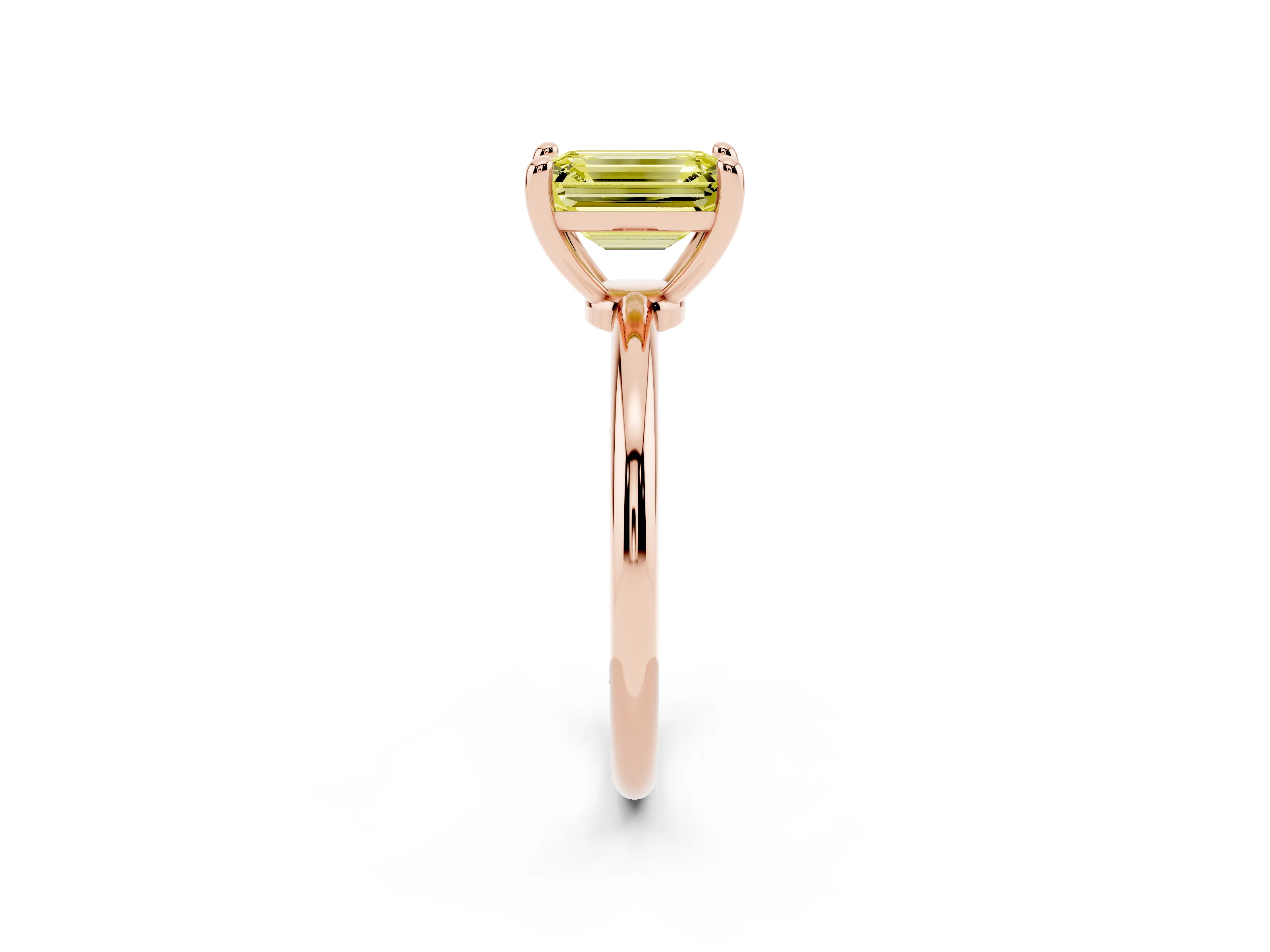 Fancy Yellow Emerald Cut Diamond Solitaire Ring Set in Rose gold with Secure Prong Setting on a Classic Band