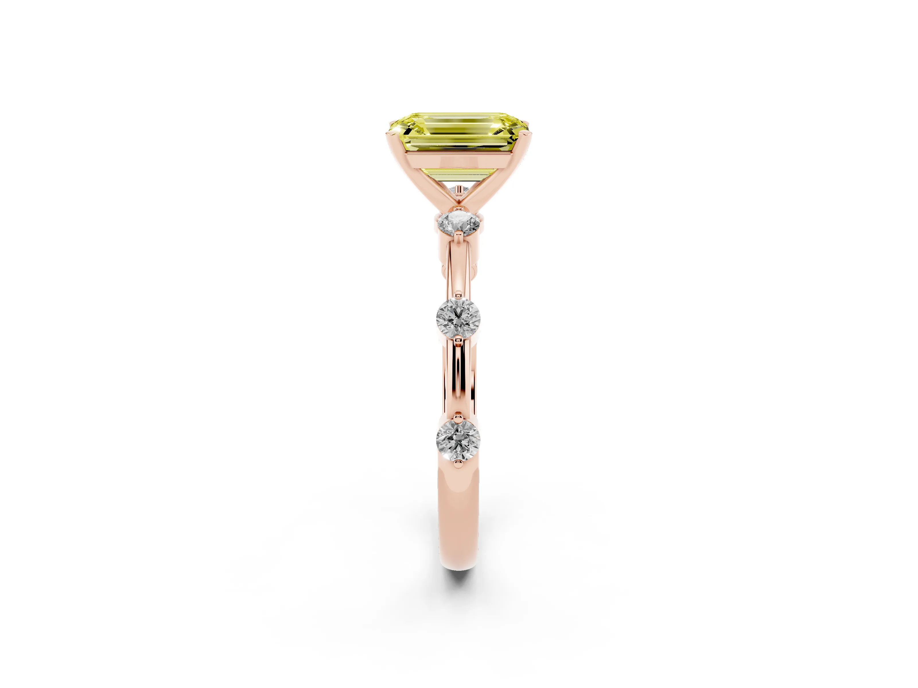 Fancy Yellow Emerald Cut Diamond Solitaire Ring Set in Rose gold with Bezel Set Side Stones and Prong Setting