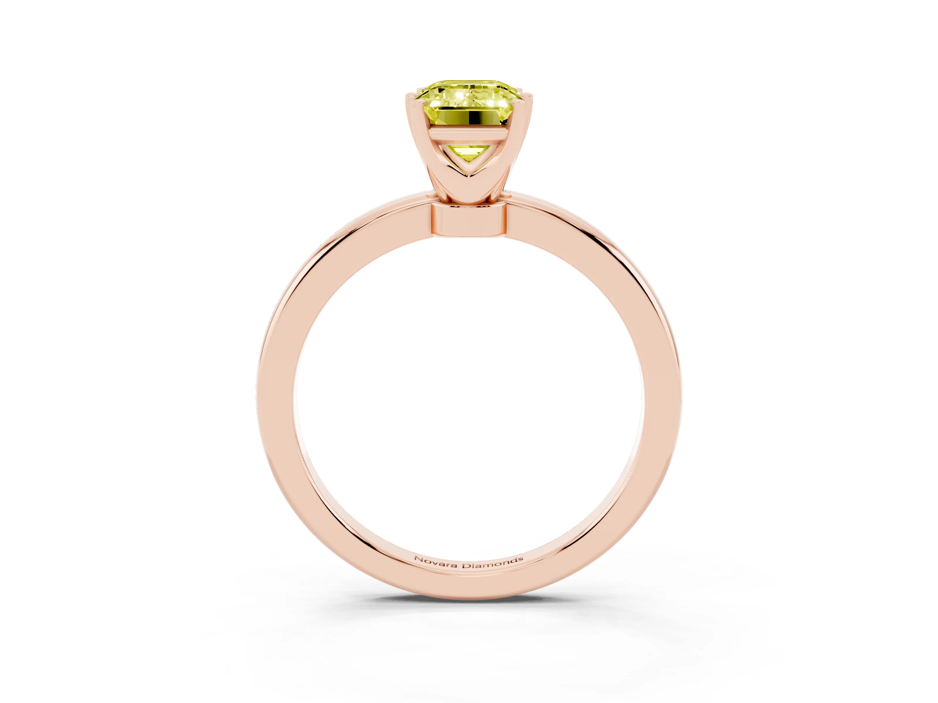 Fancy Yellow Emerald Cut Diamond Solitaire Ring Set in Rose gold with Raised Prong Setting on a Classic Band