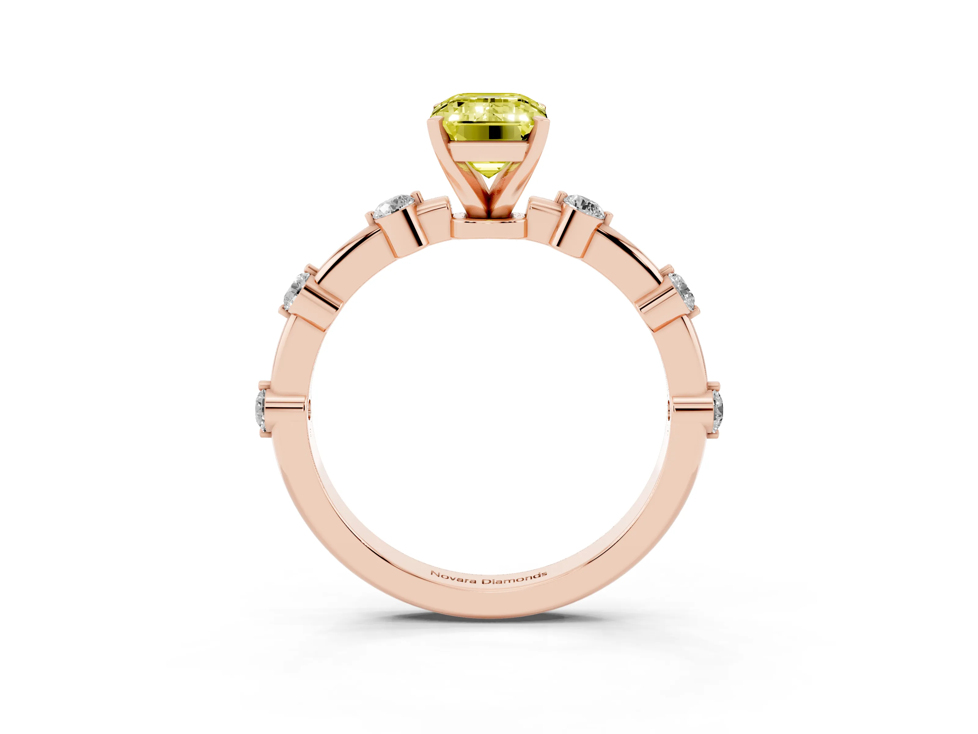 Fancy Yellow Emerald Cut Diamond Solitaire Ring Set in Rose gold with Bezel Set Side Stones and Prong Setting