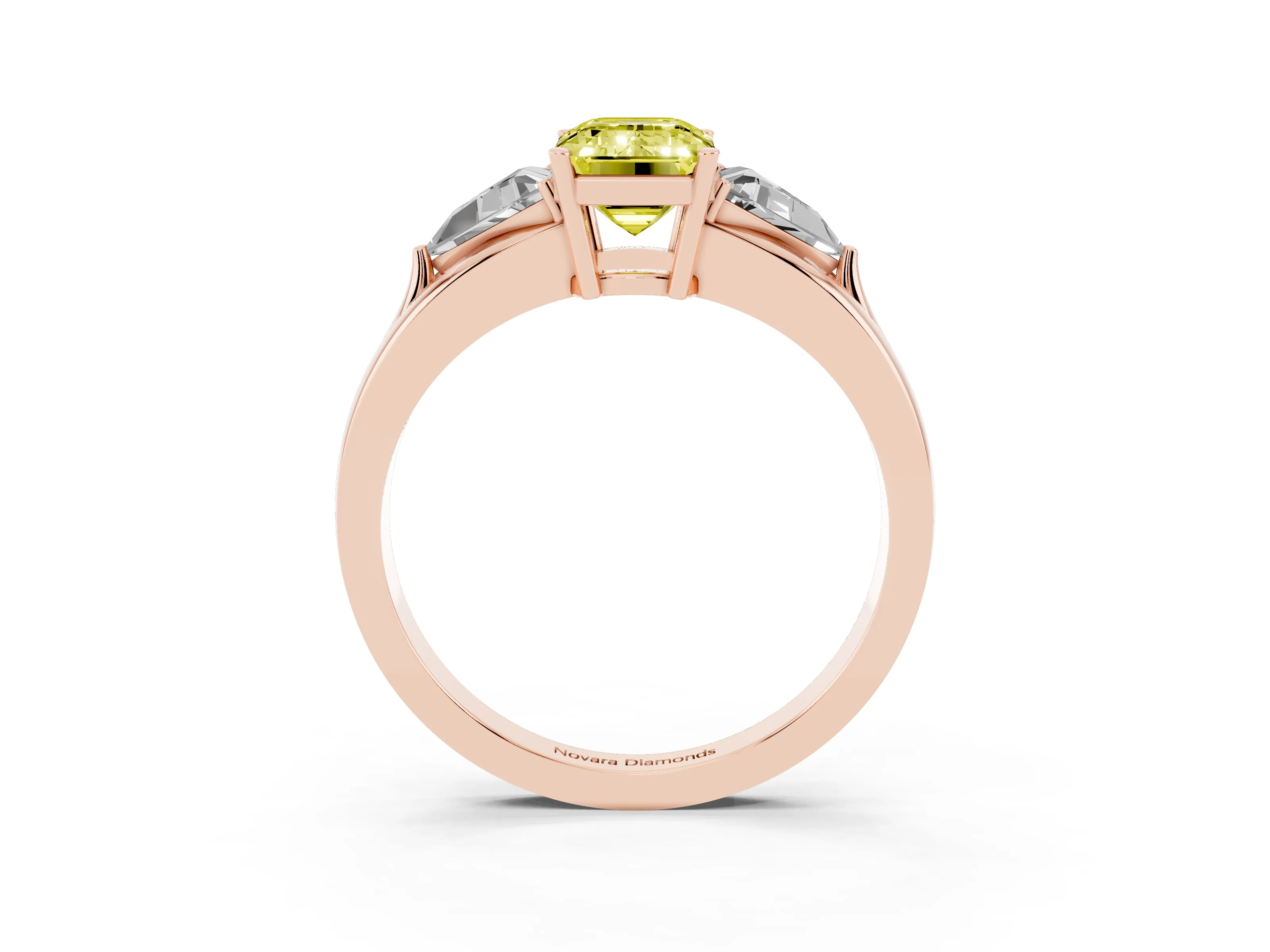 Fancy Yellow Emerald Cut Diamond Three-Stone Ring Set in Rose gold with Trillion Side Stones and Split Shank