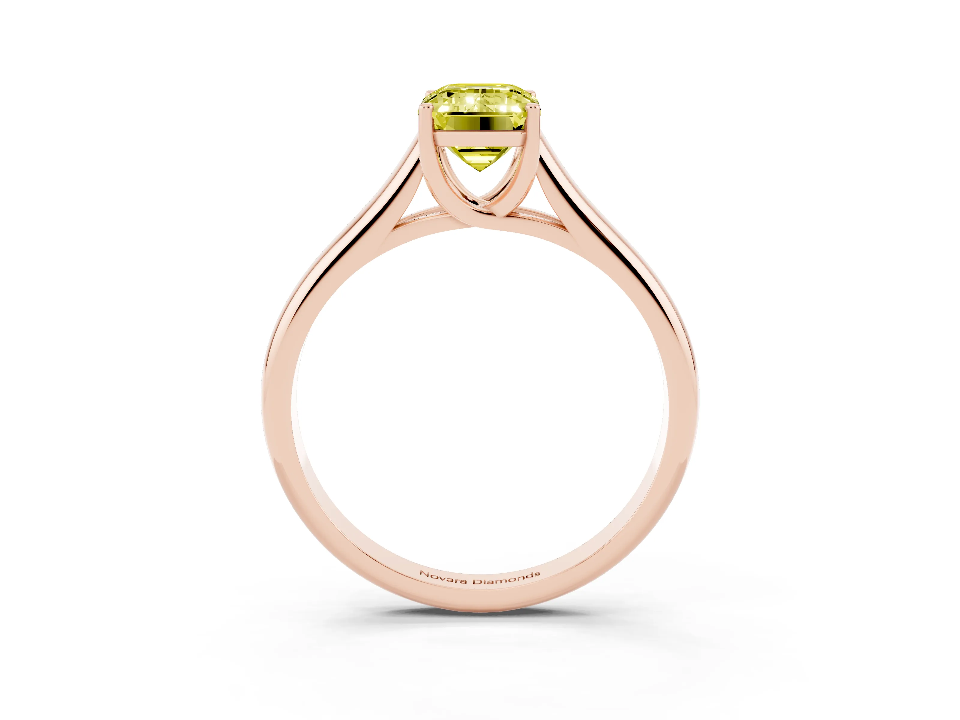 Fancy Yellow Emerald Cut Diamond Solitaire Engagement Ring Set in Rose gold with Subtly Tapered Band and Prong Setting