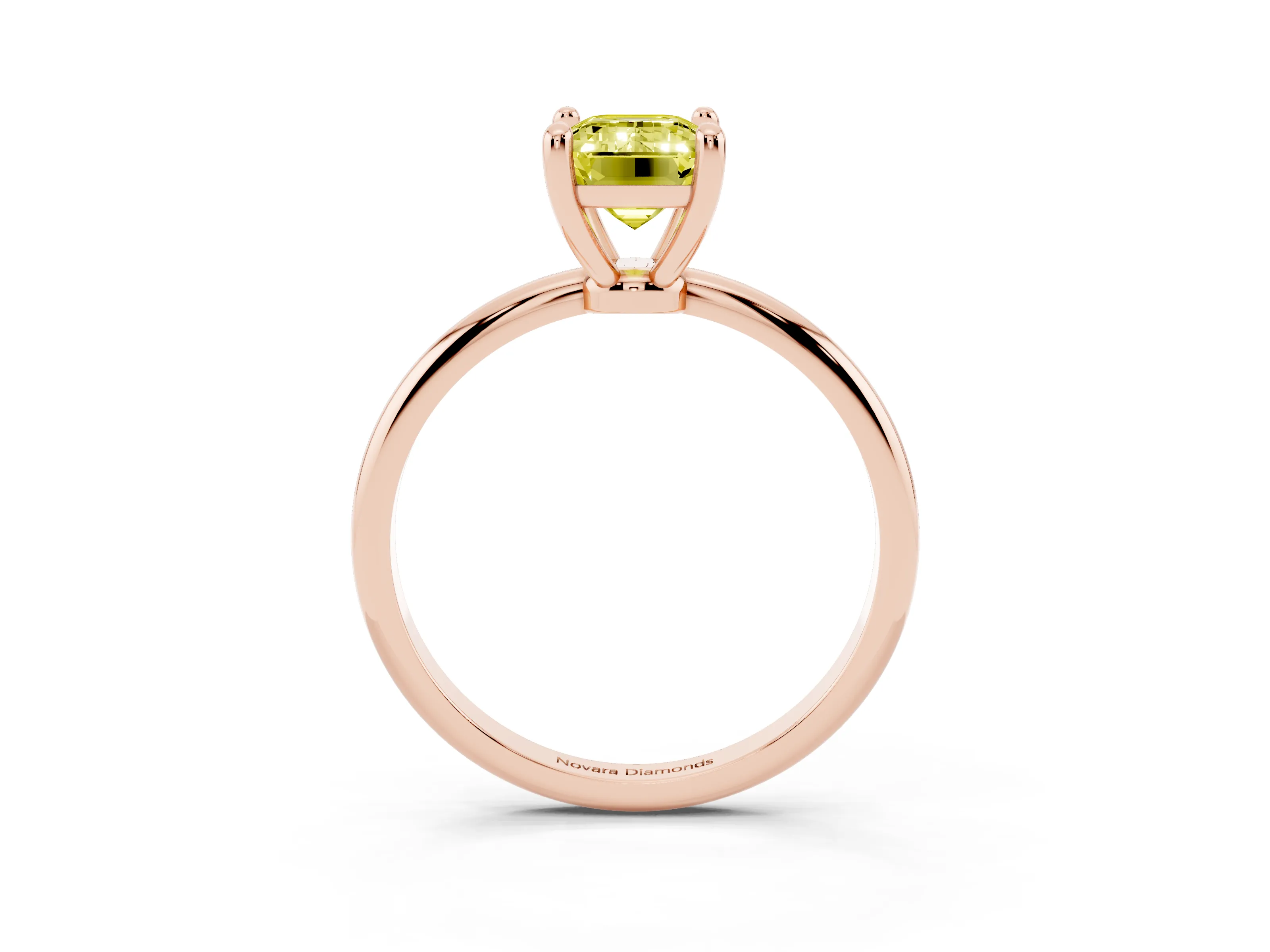 Fancy Yellow Emerald Cut Diamond Solitaire Ring Set in Rose gold with Secure Prong Setting on a Classic Band
