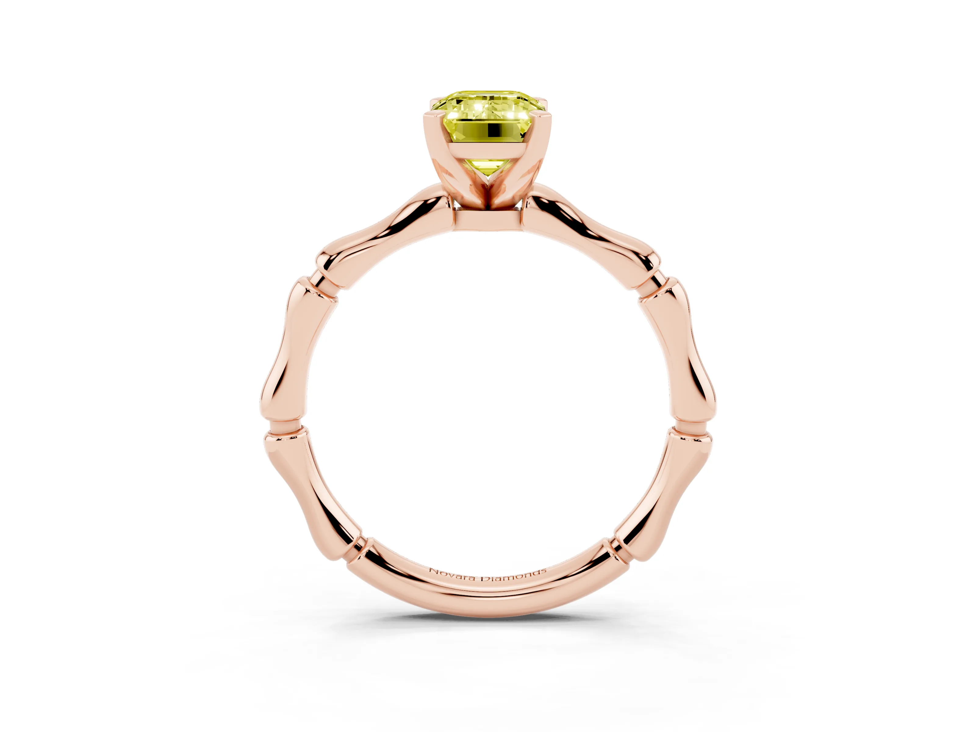 Fancy Yellow Emerald Cut Diamond Solitaire Ring Set in Rose gold with Bamboo Band and Prong Setting