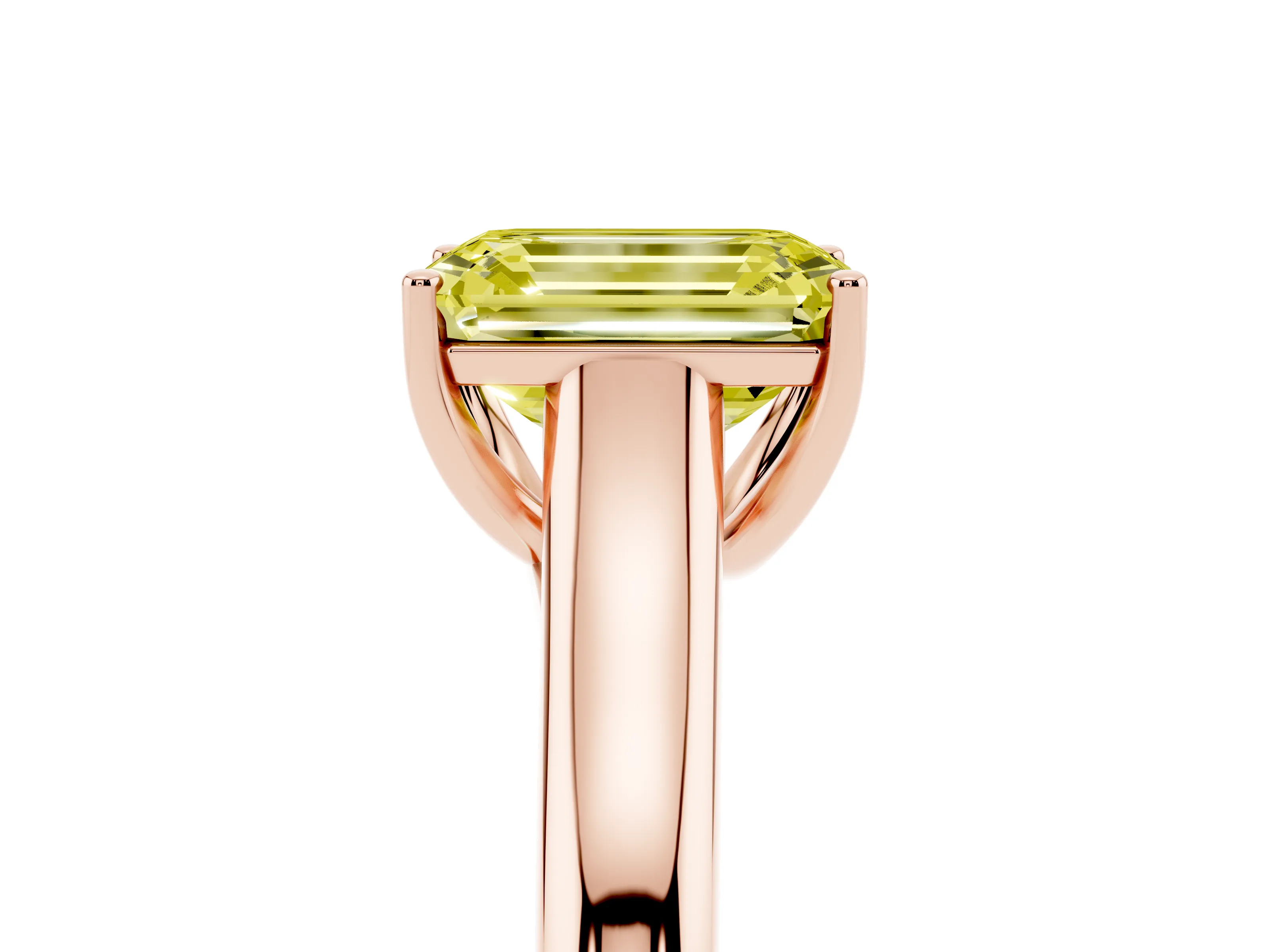 Fancy Yellow Emerald Cut Diamond Solitaire Engagement Ring Set in Rose gold with Subtly Tapered Band and Prong Setting