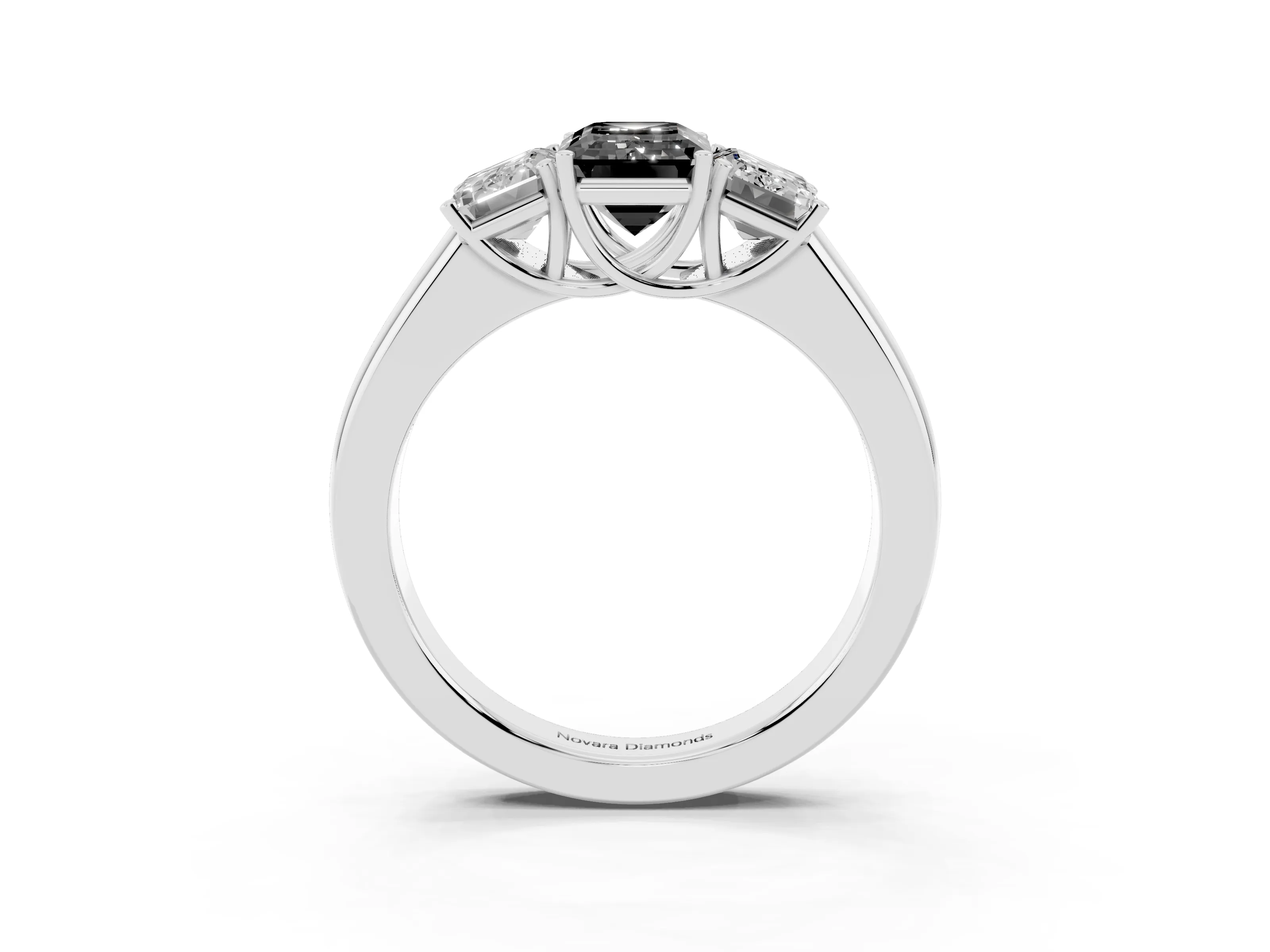 Fancy Black Three-Stone Emerald Cut Diamond Ring Set in Platinum with Matching Prong Settings and Plain Band