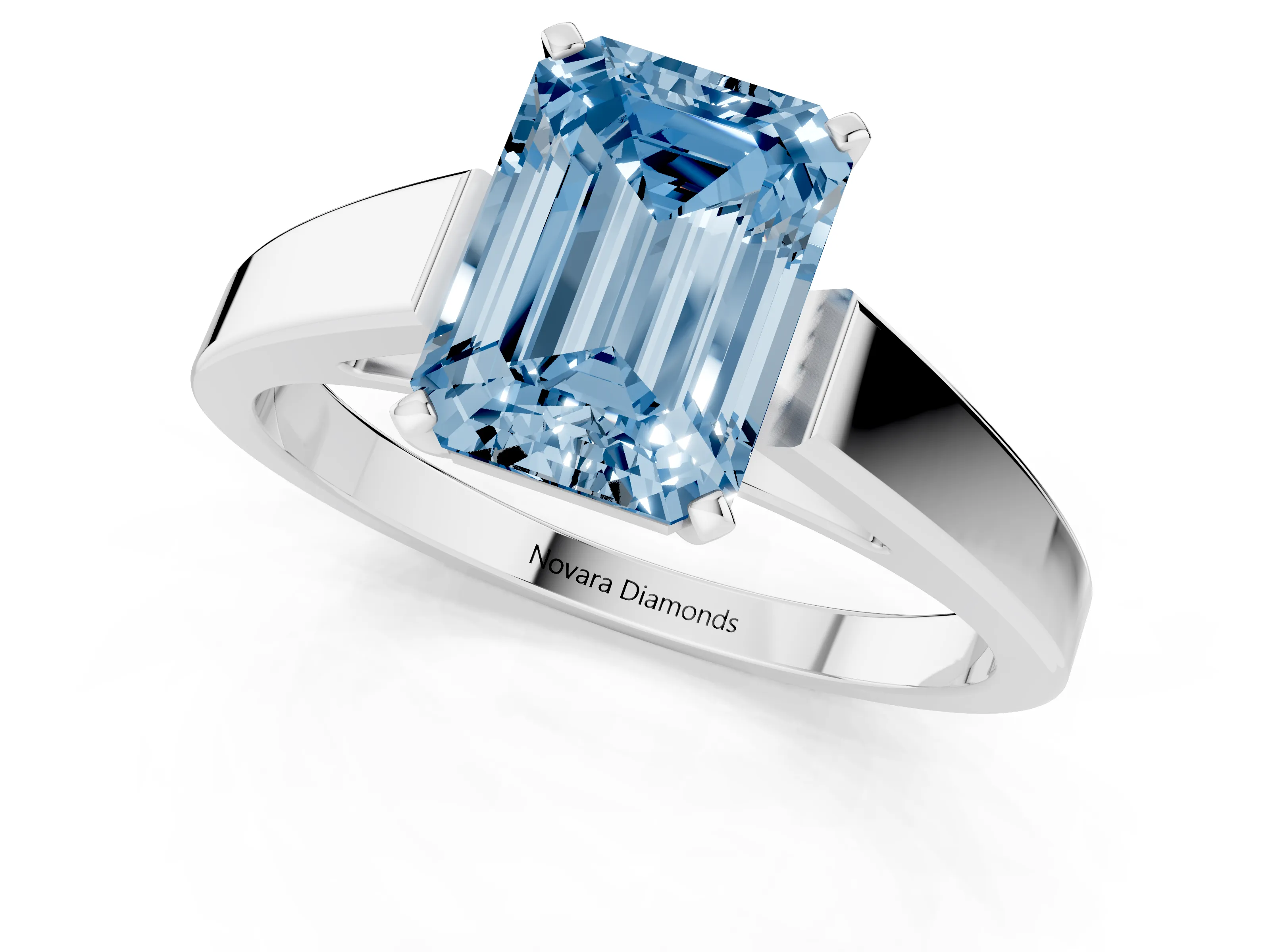 Fancy Blue Emerald Cut Diamond Solitaire Engagement Ring Set in White gold with Prong Setting and Tapered Band