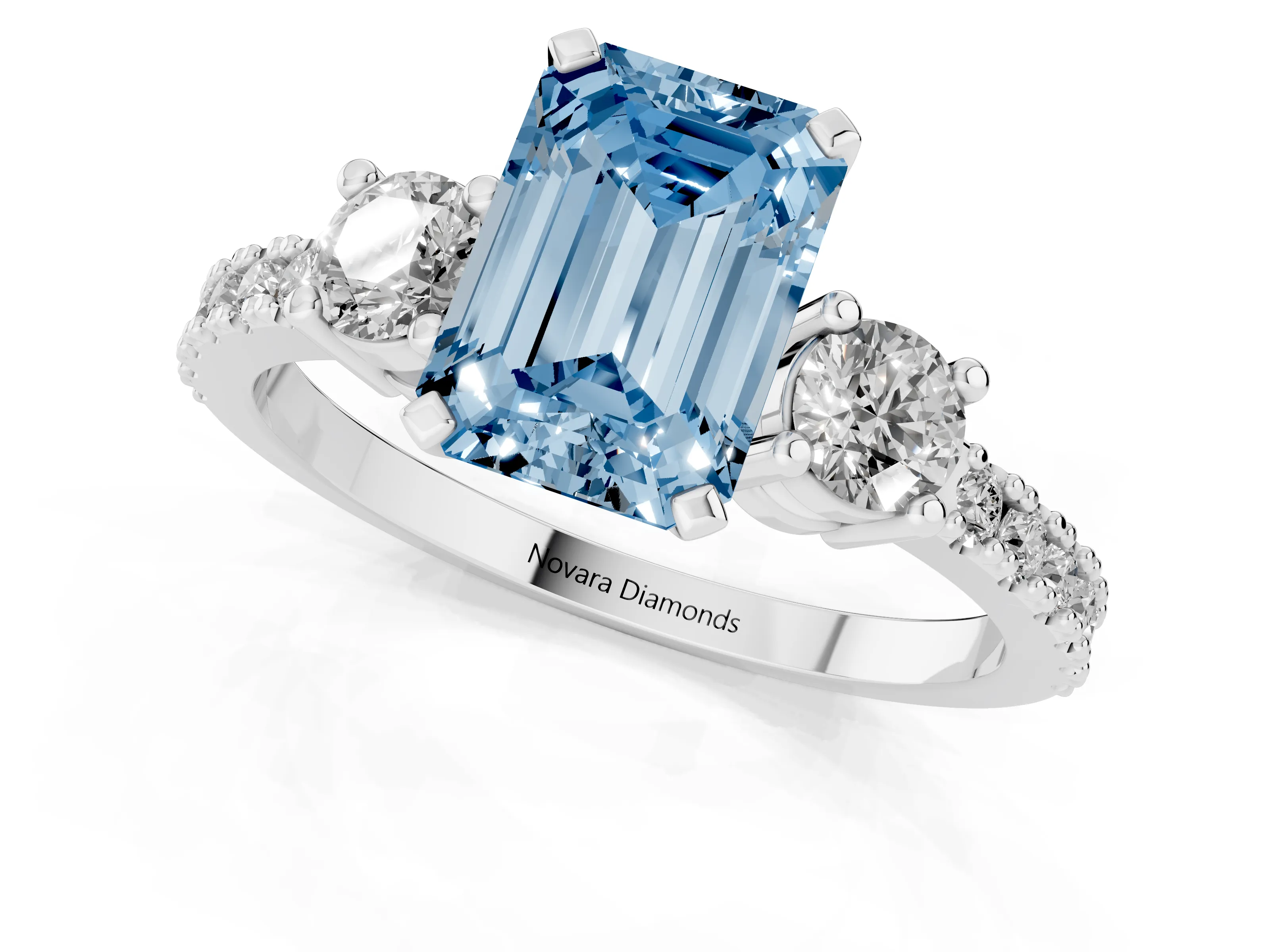 Fancy Blue Three-Stone Emerald Cut Diamond Pavé Band Ring Set in Silver with Prong Setting
