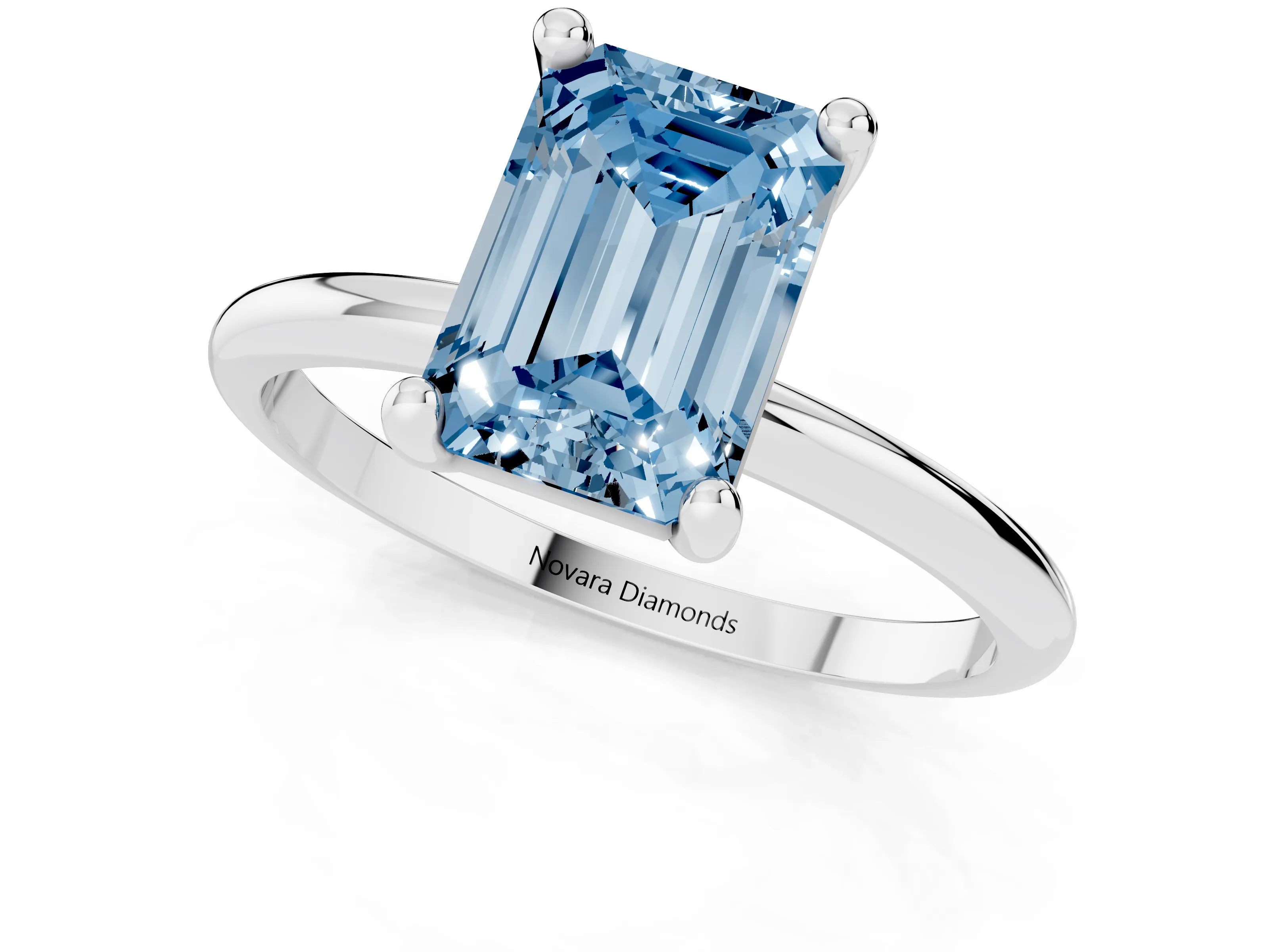 Fancy Blue Emerald Cut Diamond Solitaire Ring Set in Platinum with Secure Prong Setting on a Classic Band