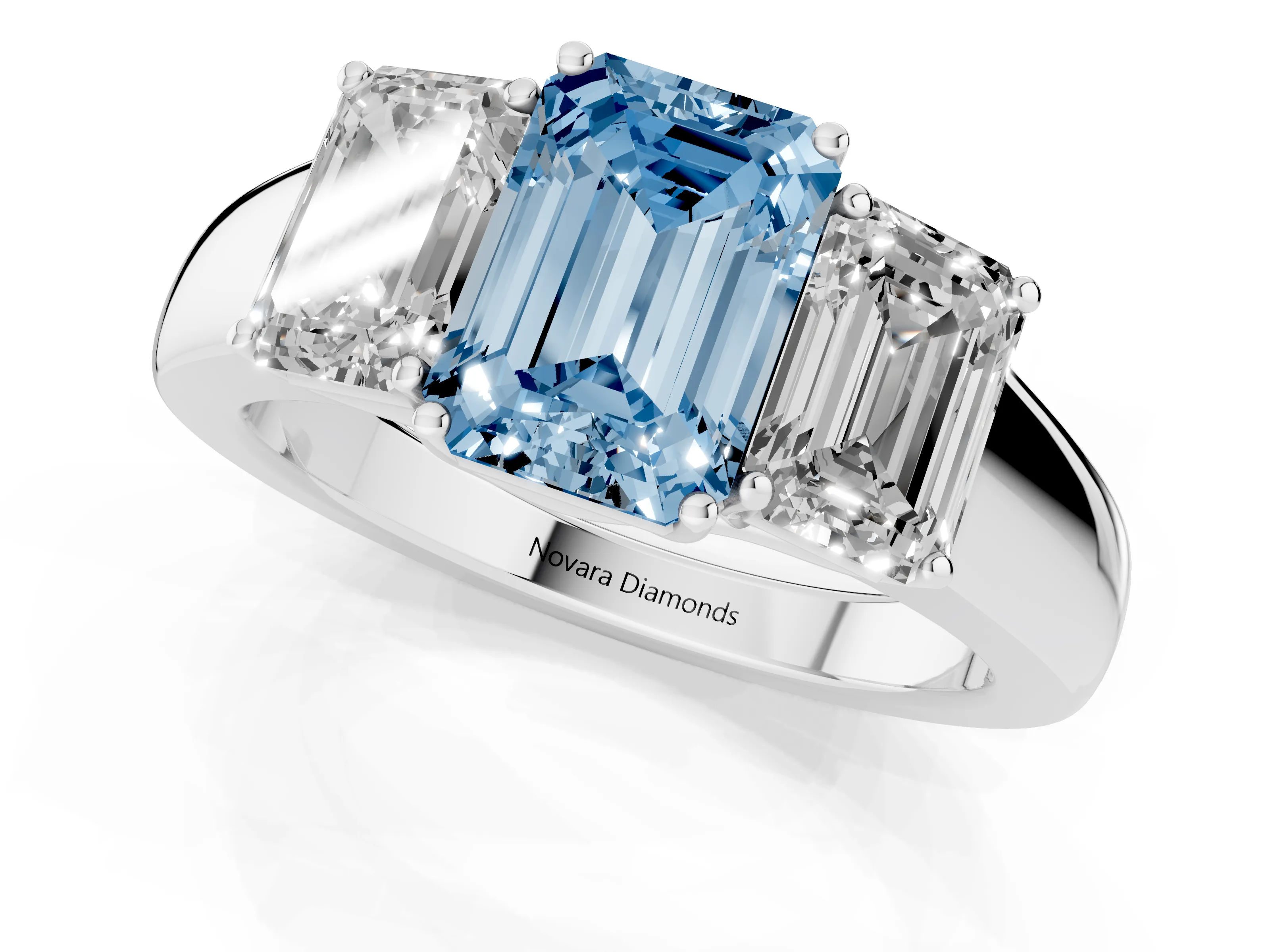 Fancy Blue Three-Stone Emerald Cut Diamond Ring Set in Platinum with Matching Prong Settings and Plain Band