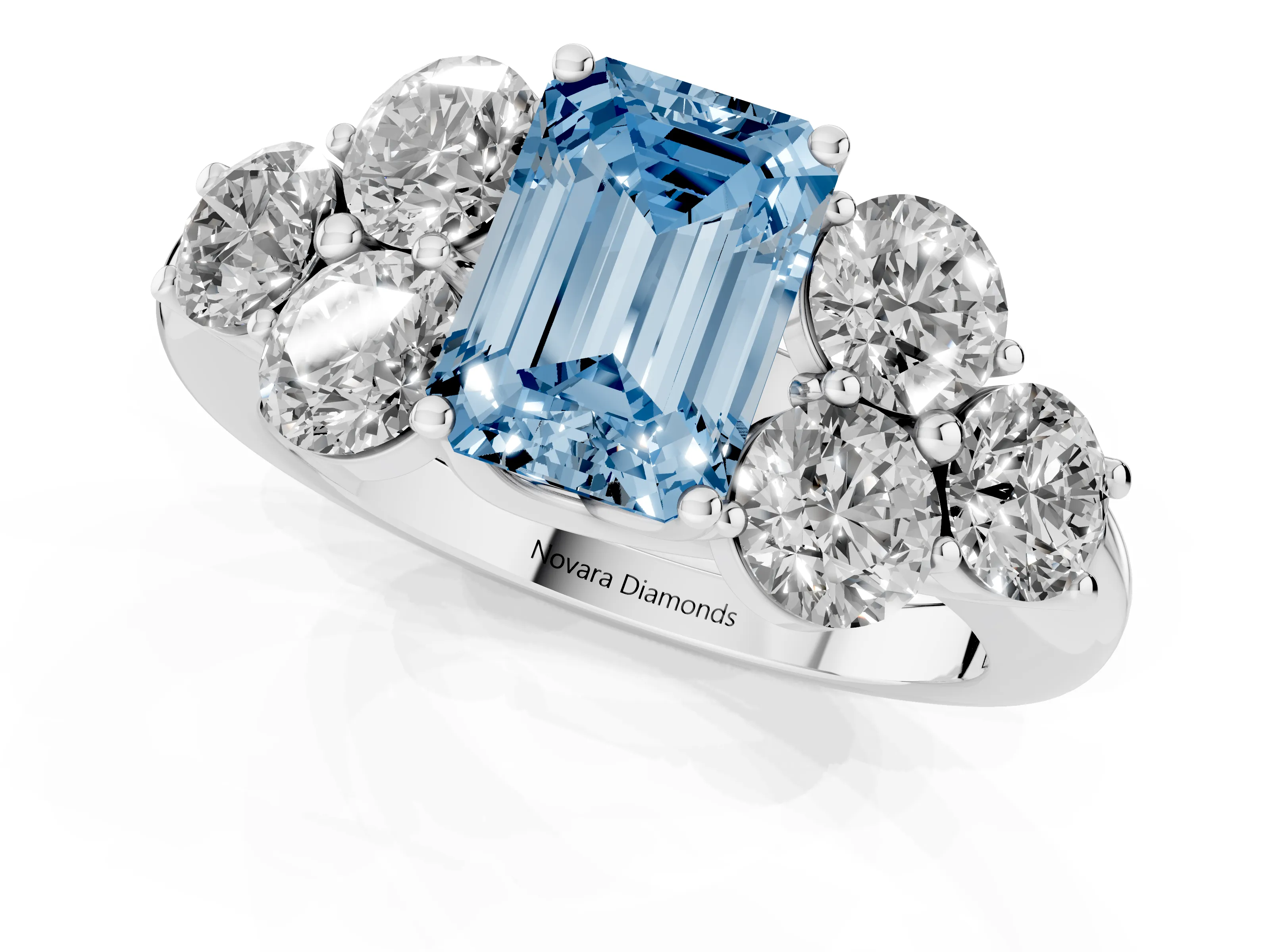 Fancy Blue Emerald Cut Diamond Cluster Ring Set in Silver with Round Accent Stones and Prong Setting on a Plain Band