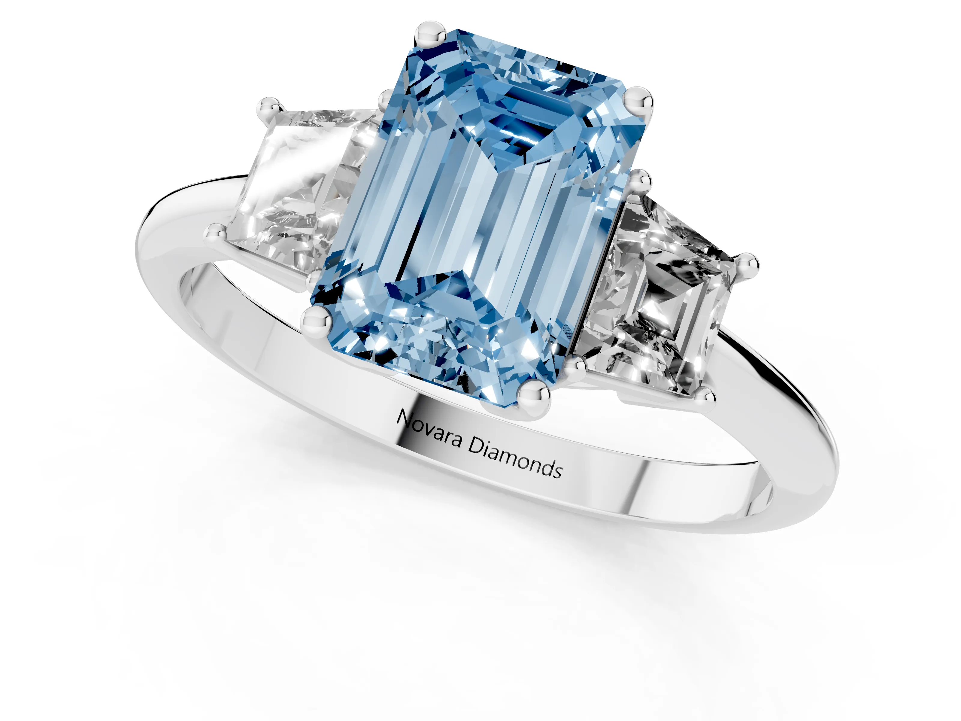 Fancy Blue Emerald Cut Diamond Three-Stone Ring Set in Silver with Trapezoid Side Stones and Prong Setting