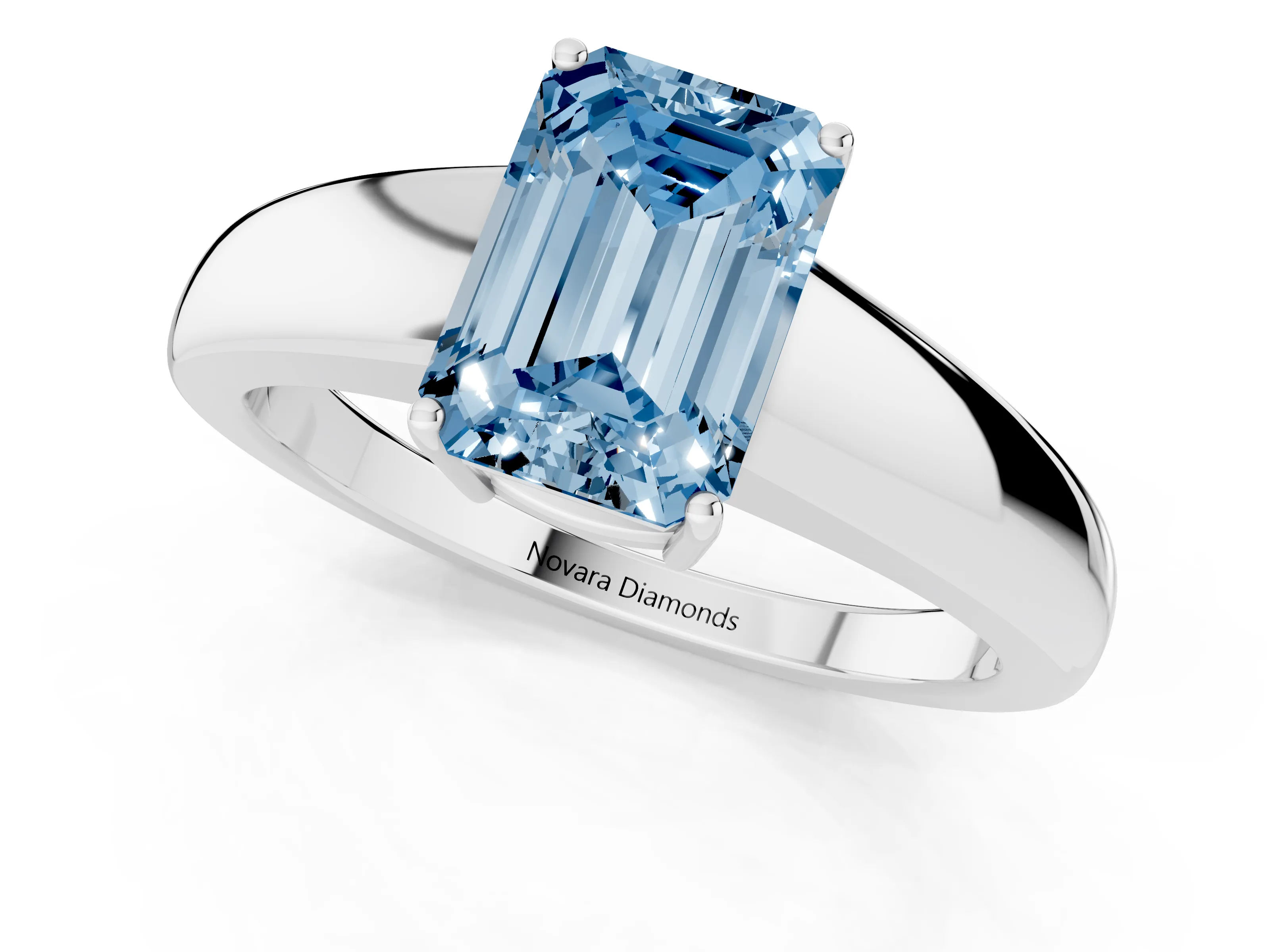 Fancy Blue Emerald Cut Diamond Solitaire Ring Set in White gold with Tapered Band and Prong Setting