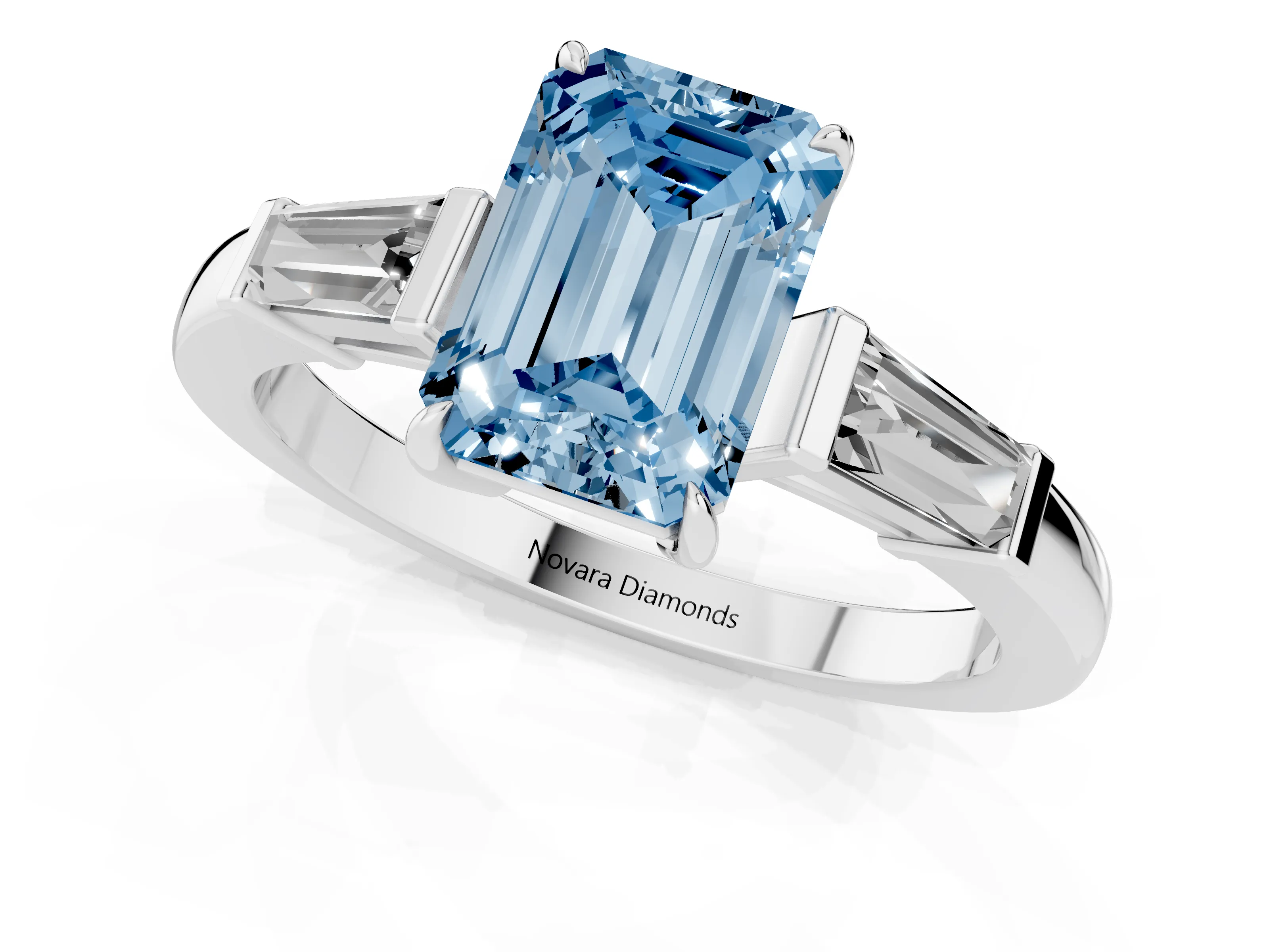 Fancy Blue Emerald Cut Diamond Three-Stone Ring Set in Platinum with Tapered Baguette Side Stones and Prong Setting