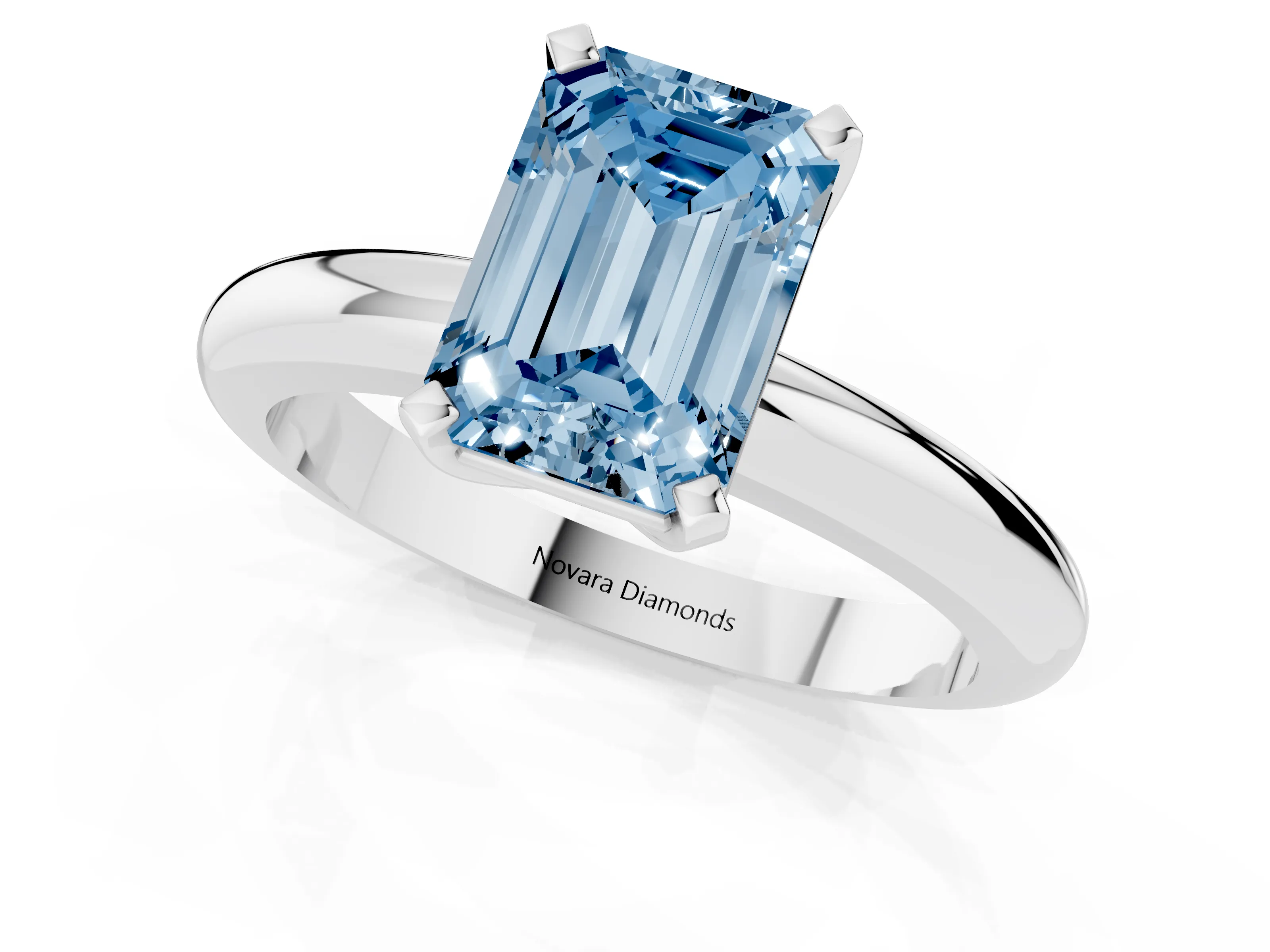 Fancy Blue Emerald Cut Diamond Solitaire Engagement Ring Set in Platinum with Round Band and Prong Setting