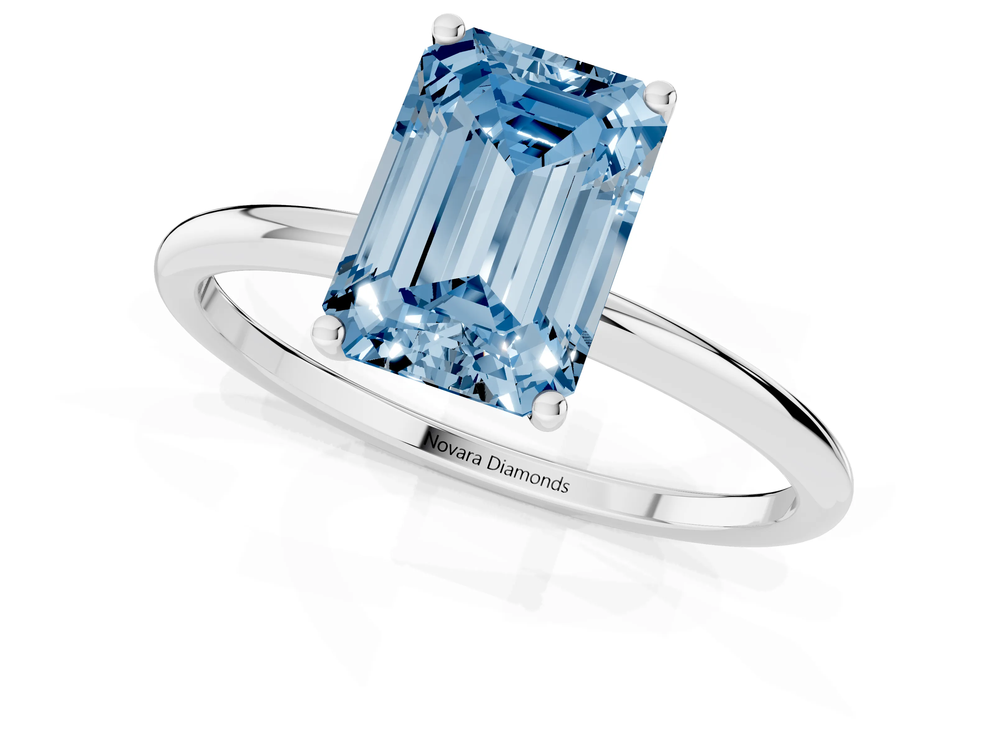 Fancy Blue Emerald Cut Diamond Solitaire Engagement Ring Set in Platinum with Thin Band and Prong Setting