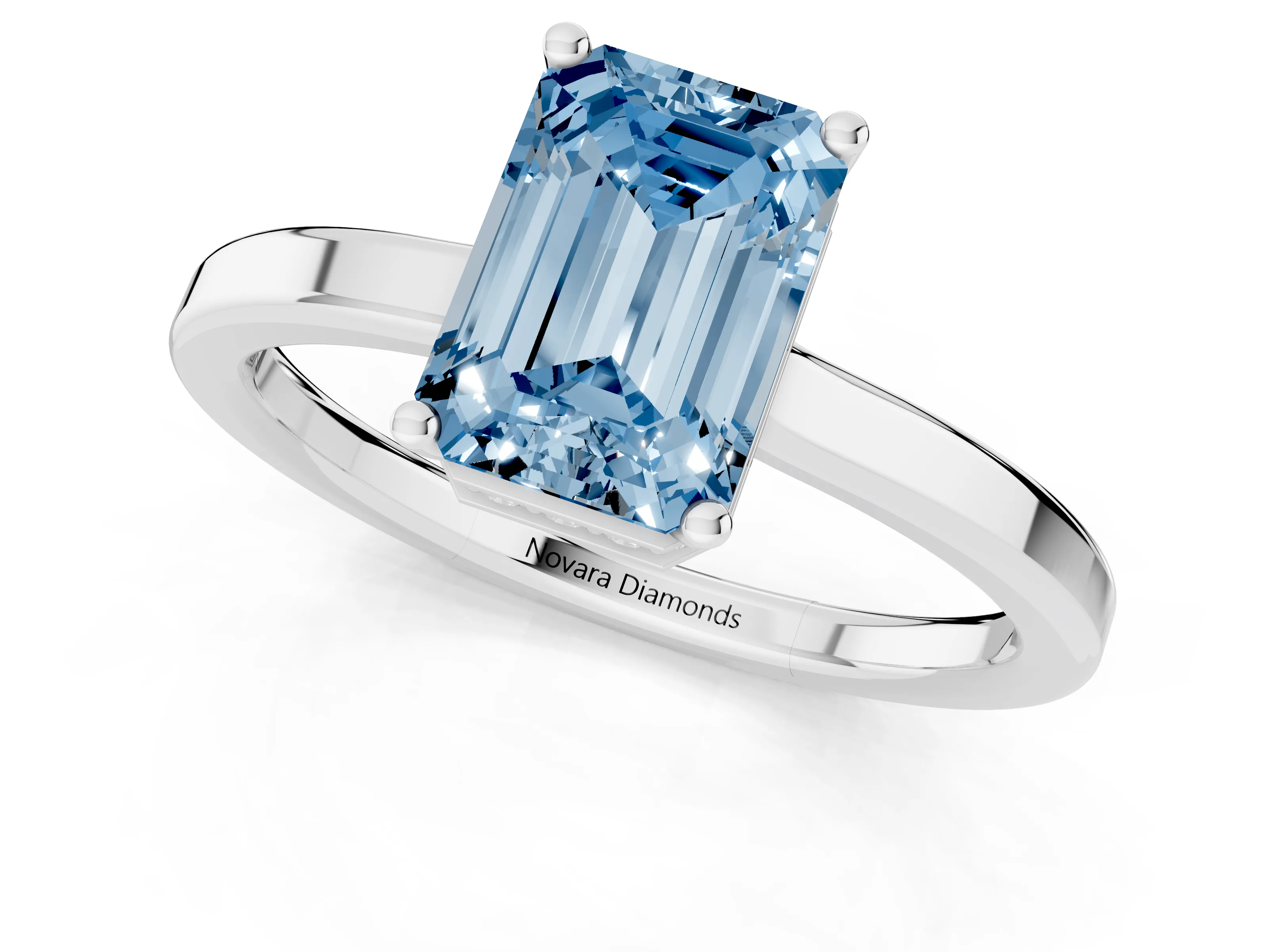 Fancy Blue Emerald Cut Diamond Solitaire Engagement Ring Set in Platinum with Prong Setting on a Plain Band