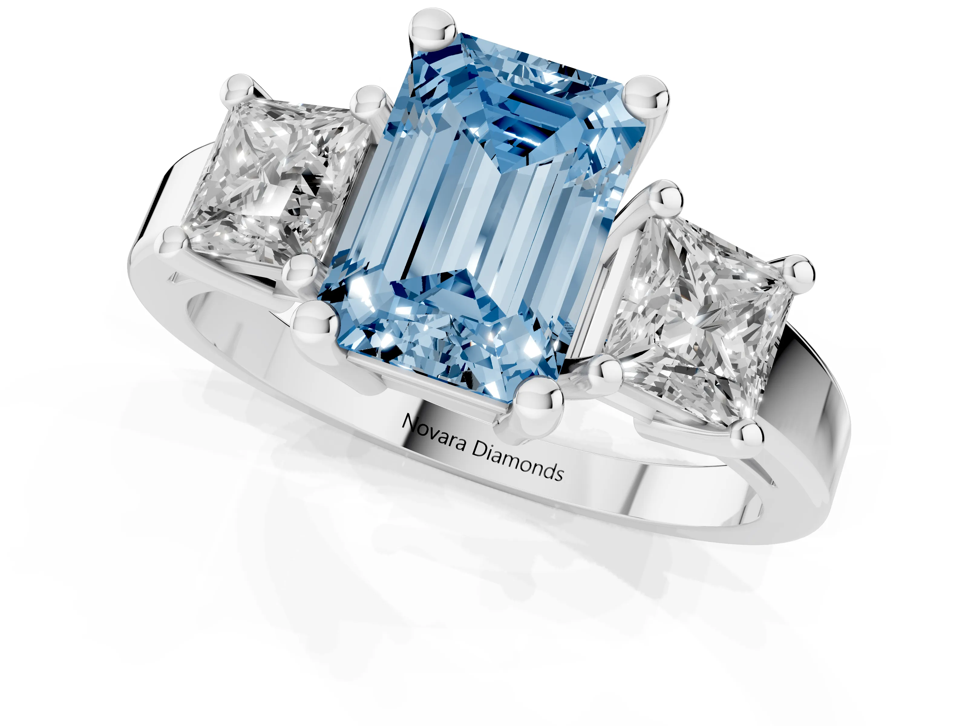 Fancy Blue Three-Stone Emerald Cut Diamond Solitaire Ring Set in Platinum with Prong Setting