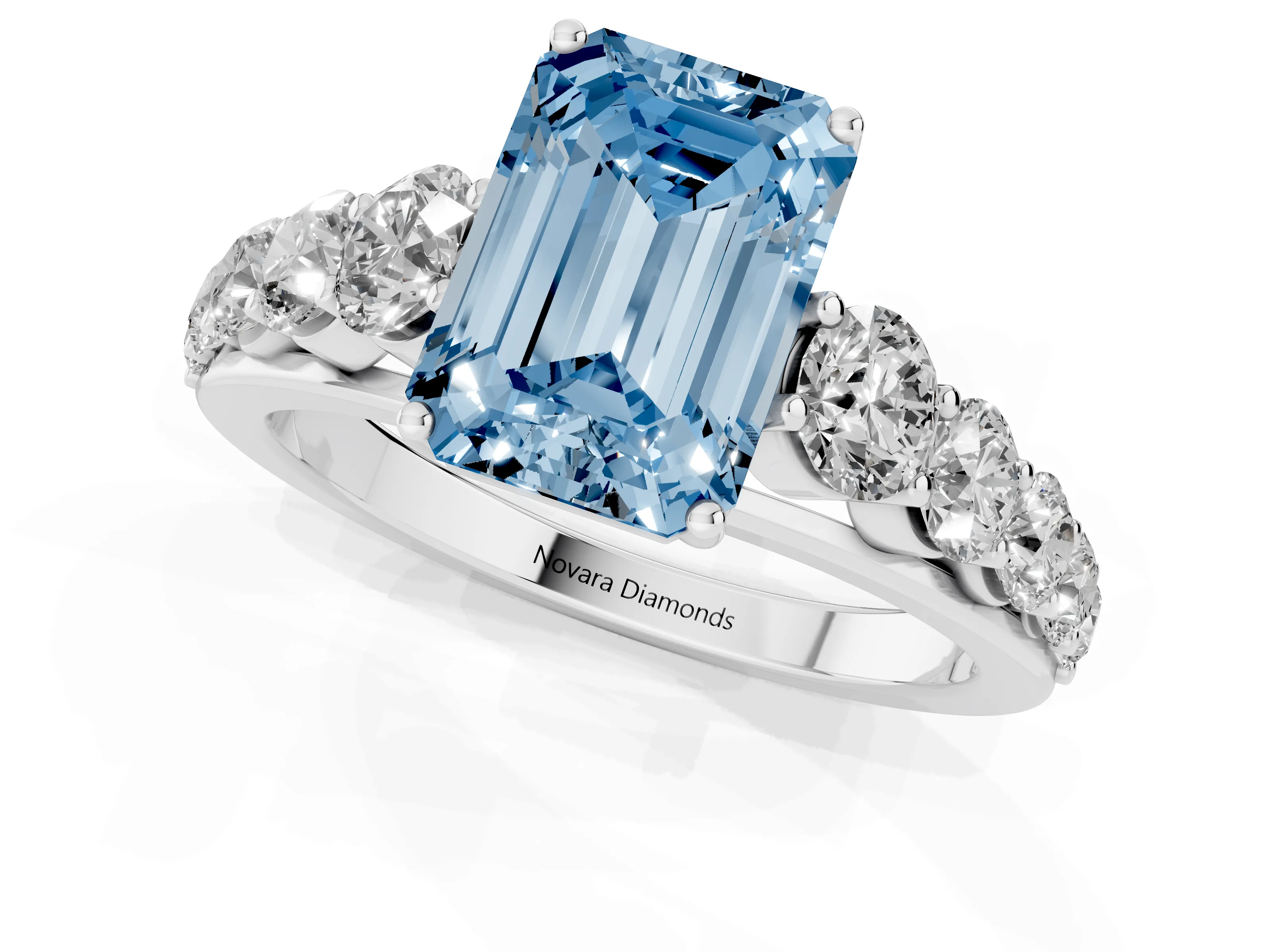 Fancy Blue Emerald Cut Diamond Solitaire Ring Set in White gold with Pavé-Set Band and Prong Setting