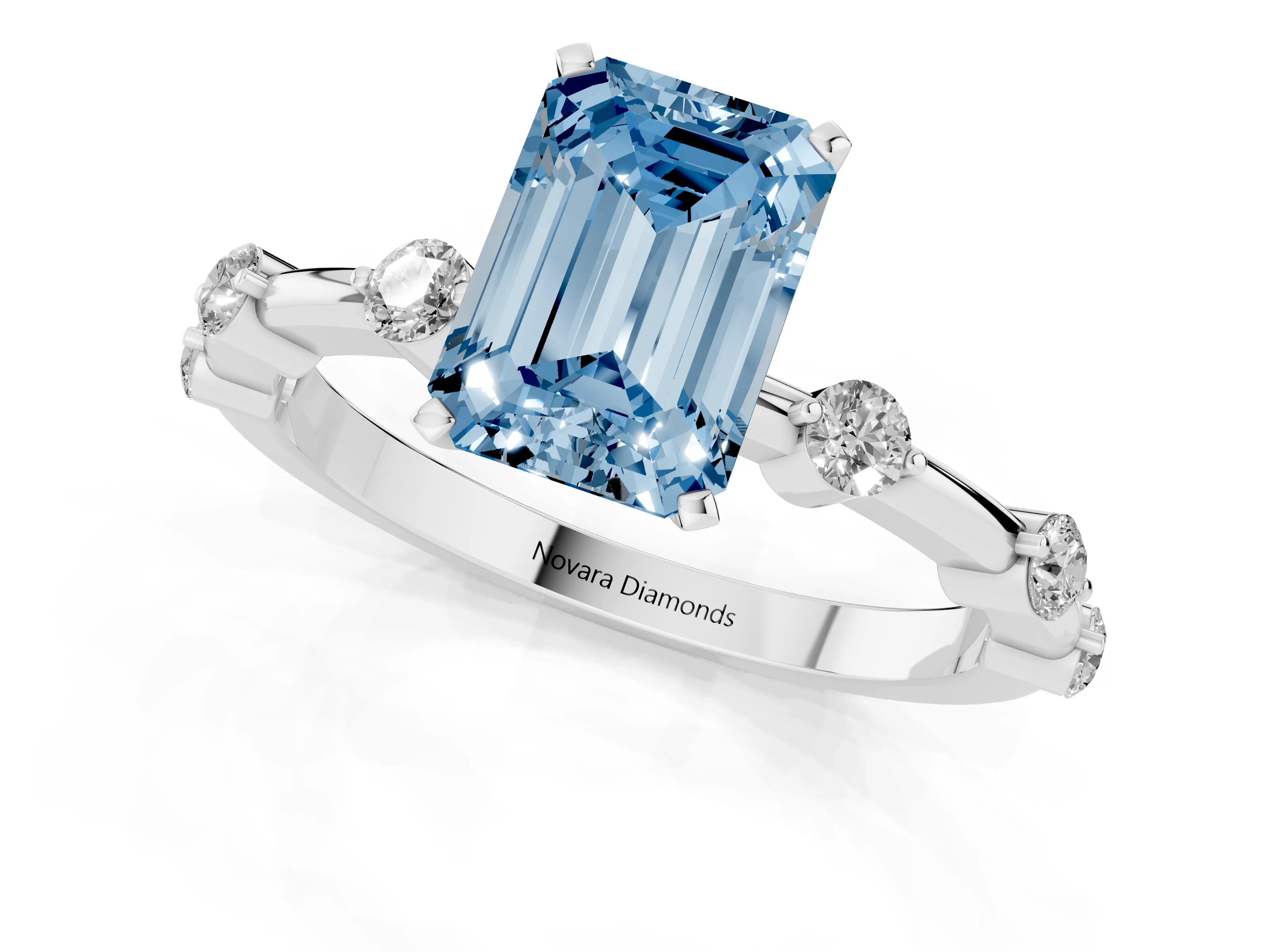 Fancy Blue Emerald Cut Diamond Solitaire Ring Set in White gold with Bezel Set Side Stones and Prong Setting