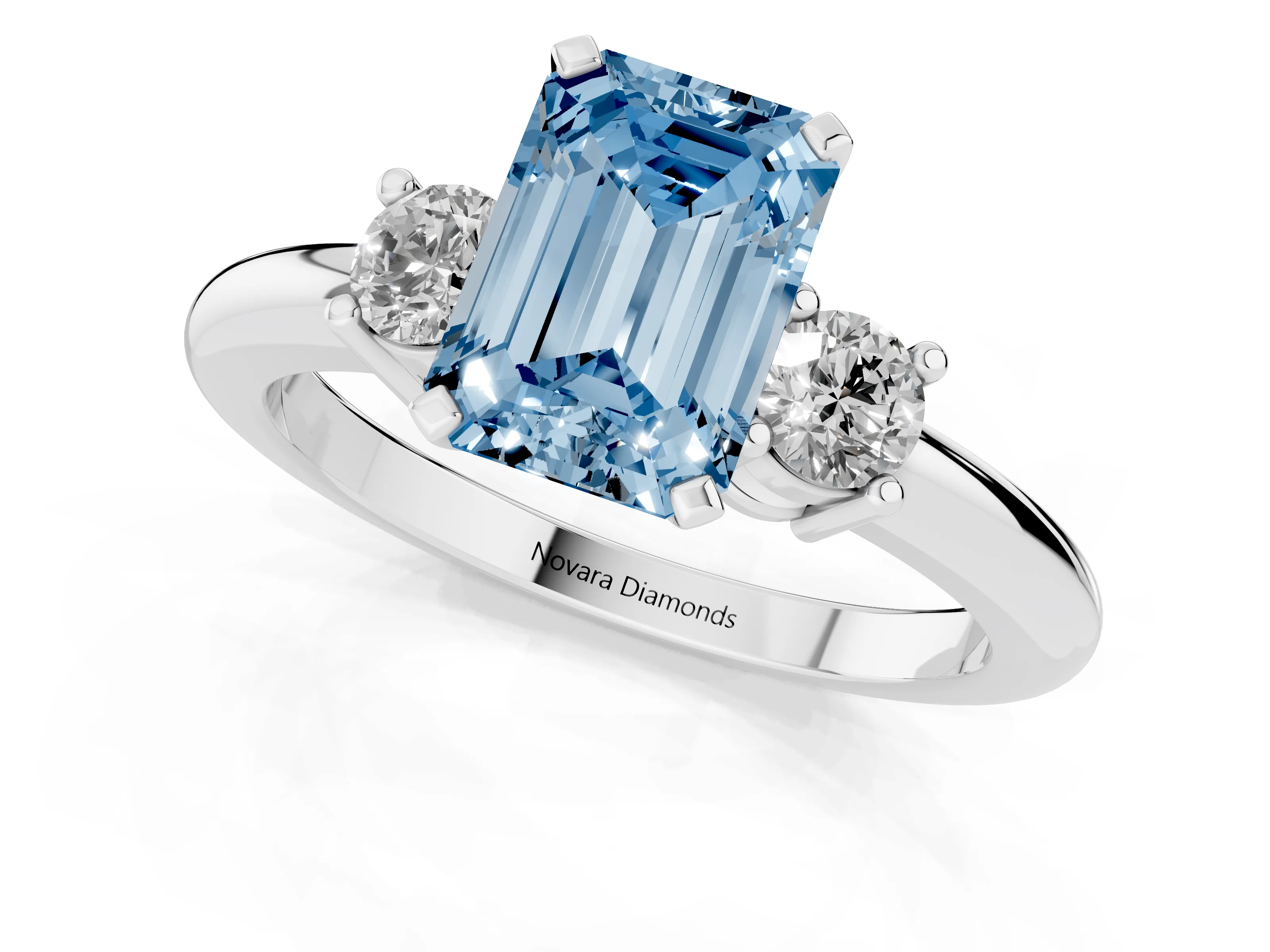 Fancy Blue Three-Stone Emerald Cut Diamond Ring Set in Platinum with Prong Setting and Plain Band