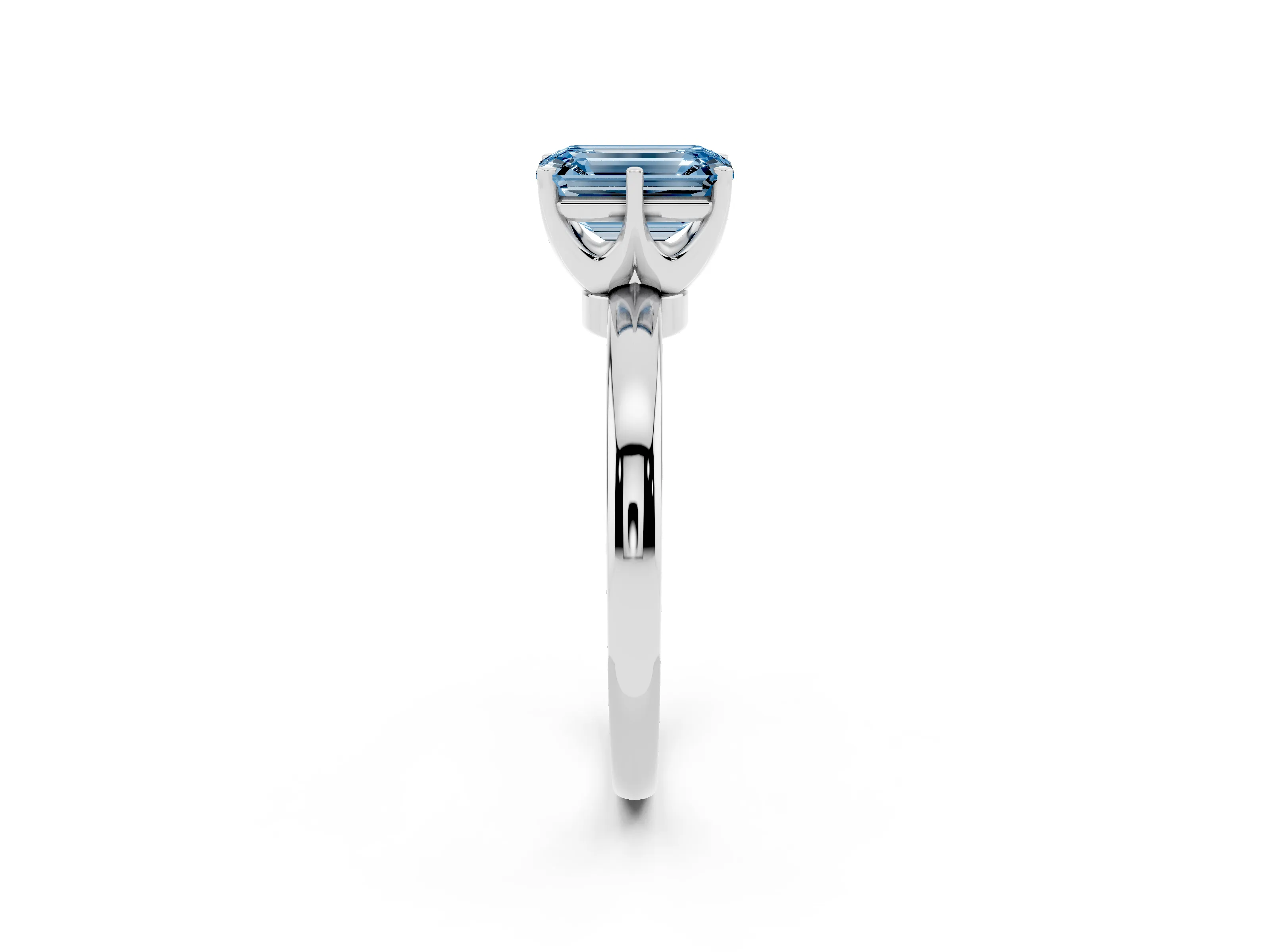 Fancy Blue Emerald Cut Diamond Solitaire Ring Set in Silver with Raised Prong Setting on a Classic Band