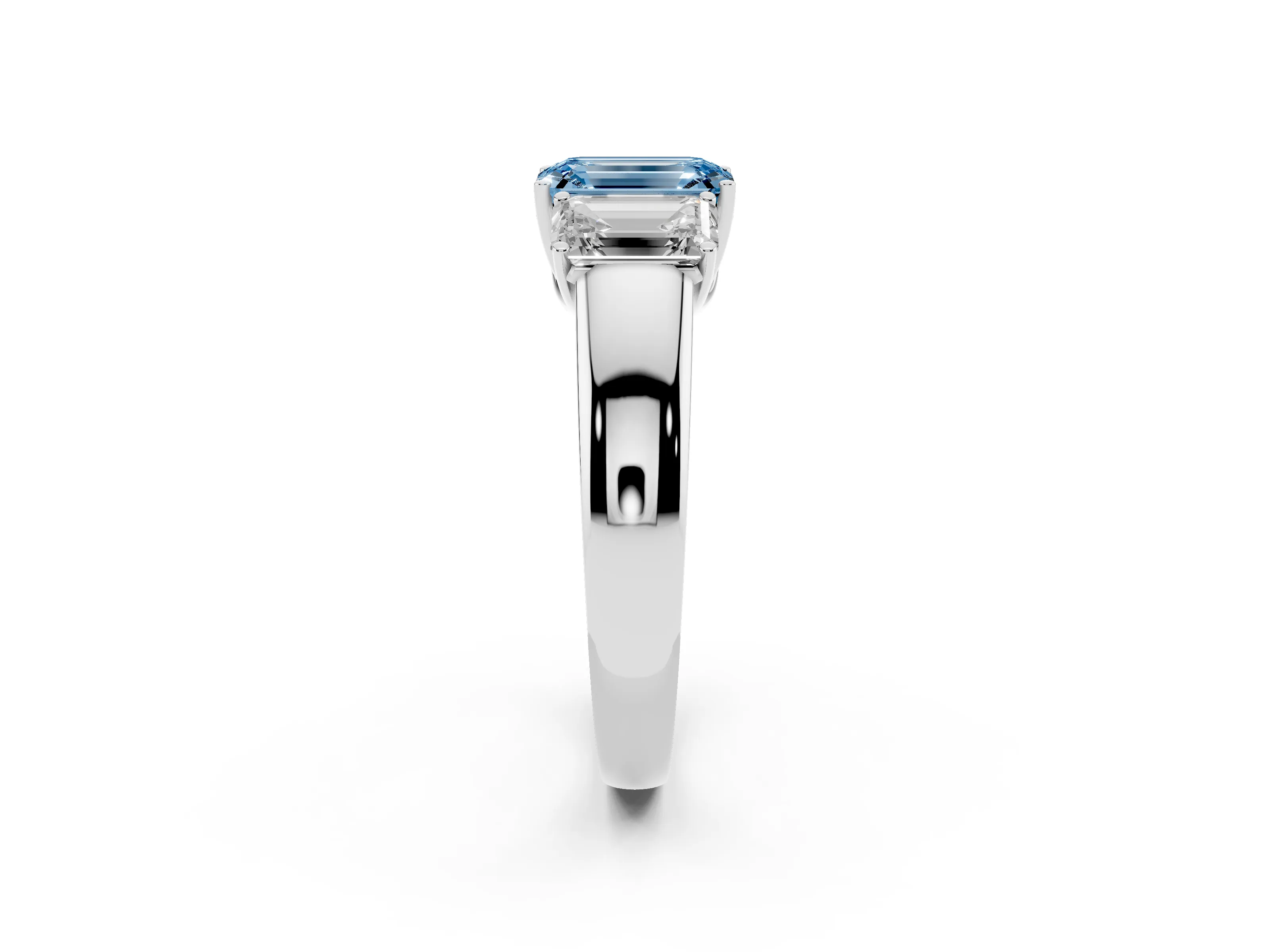 Fancy Blue Three-Stone Emerald Cut Diamond Ring Set in Platinum with Matching Prong Settings and Plain Band