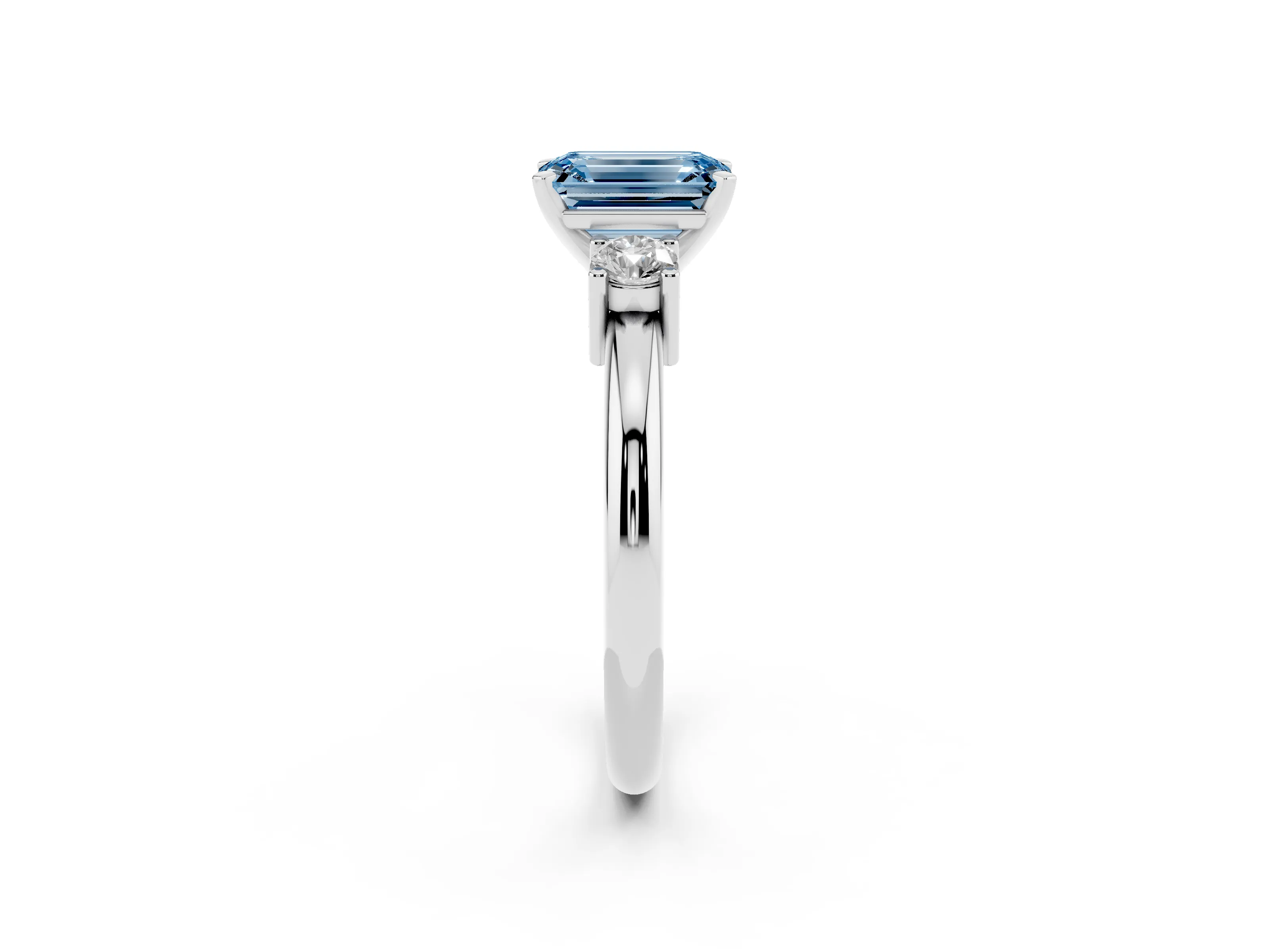 Fancy Blue Three-Stone Emerald Cut Diamond Ring Set in Platinum with Prong Setting and Plain Band