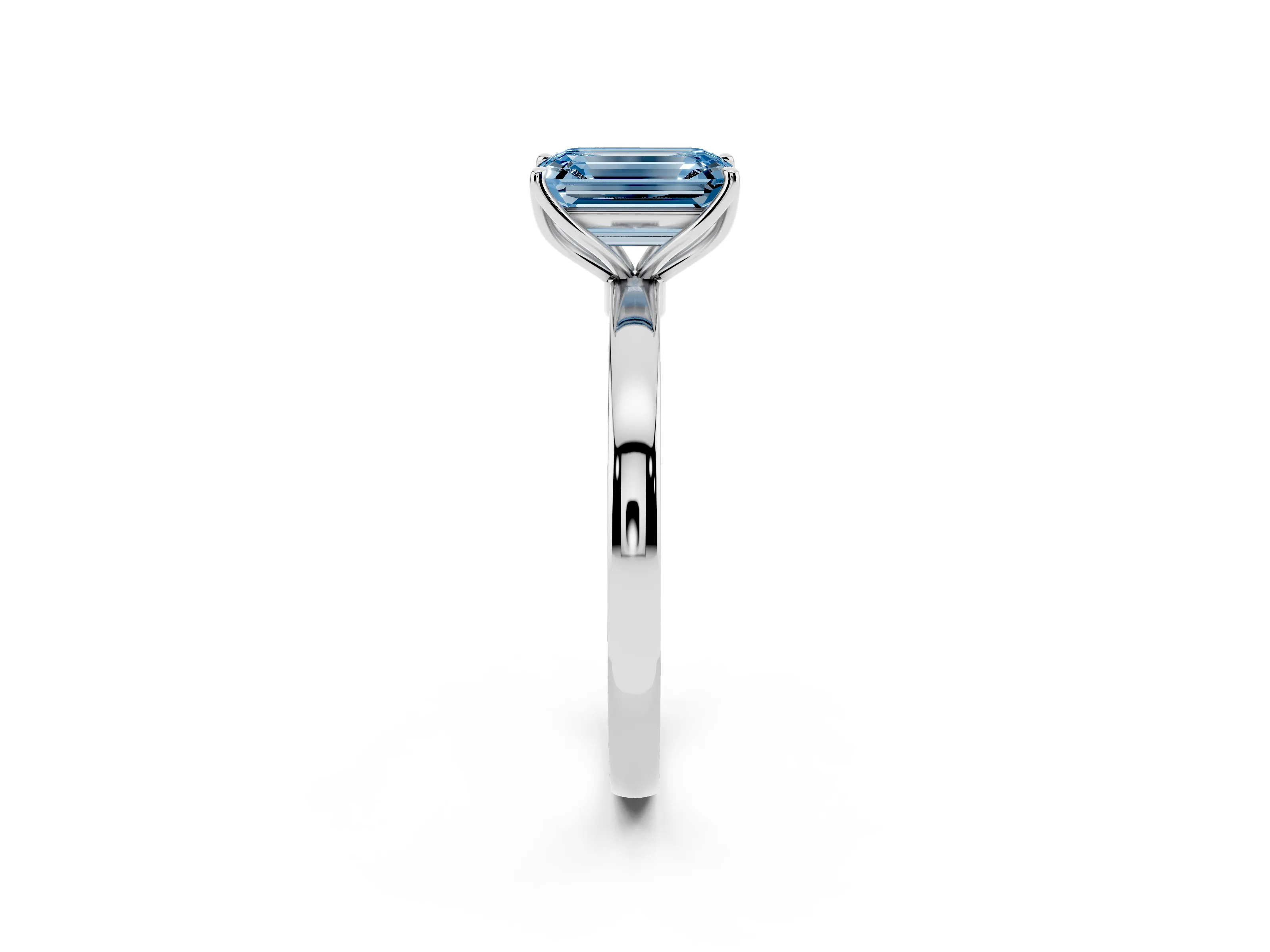 Fancy Blue Emerald Cut Diamond Solitaire Ring Set in White gold with Prong Setting and Thin Polished Band