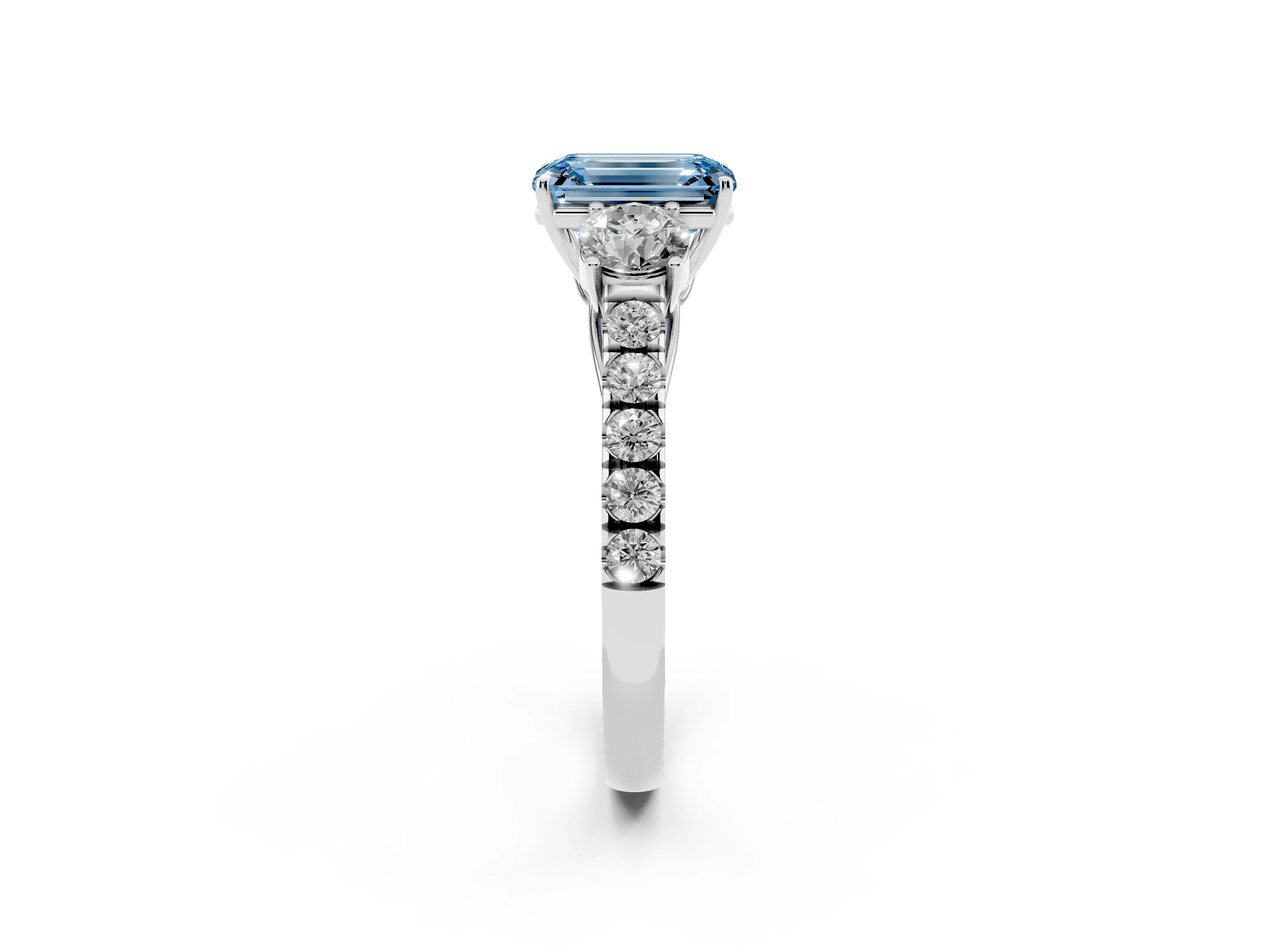 Fancy Blue Emerald Cut Diamond Three-Stone Ring Set in White gold with Round Side Stones and Delicate Pavé Band