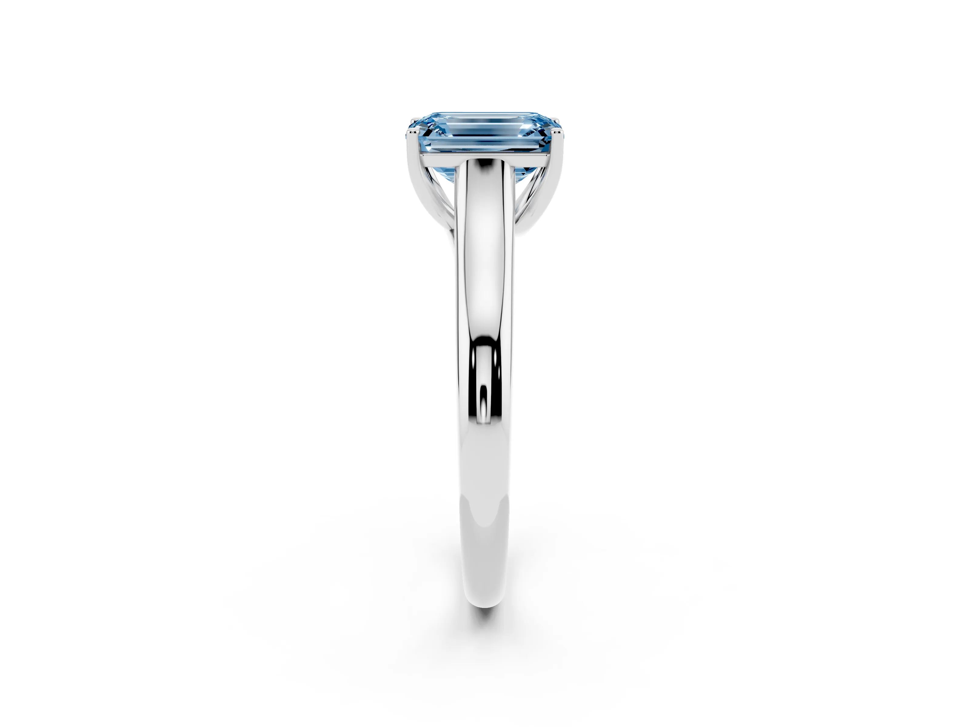 Fancy Blue Emerald Cut Diamond Solitaire Engagement Ring Set in White gold with Subtly Tapered Band and Prong Setting