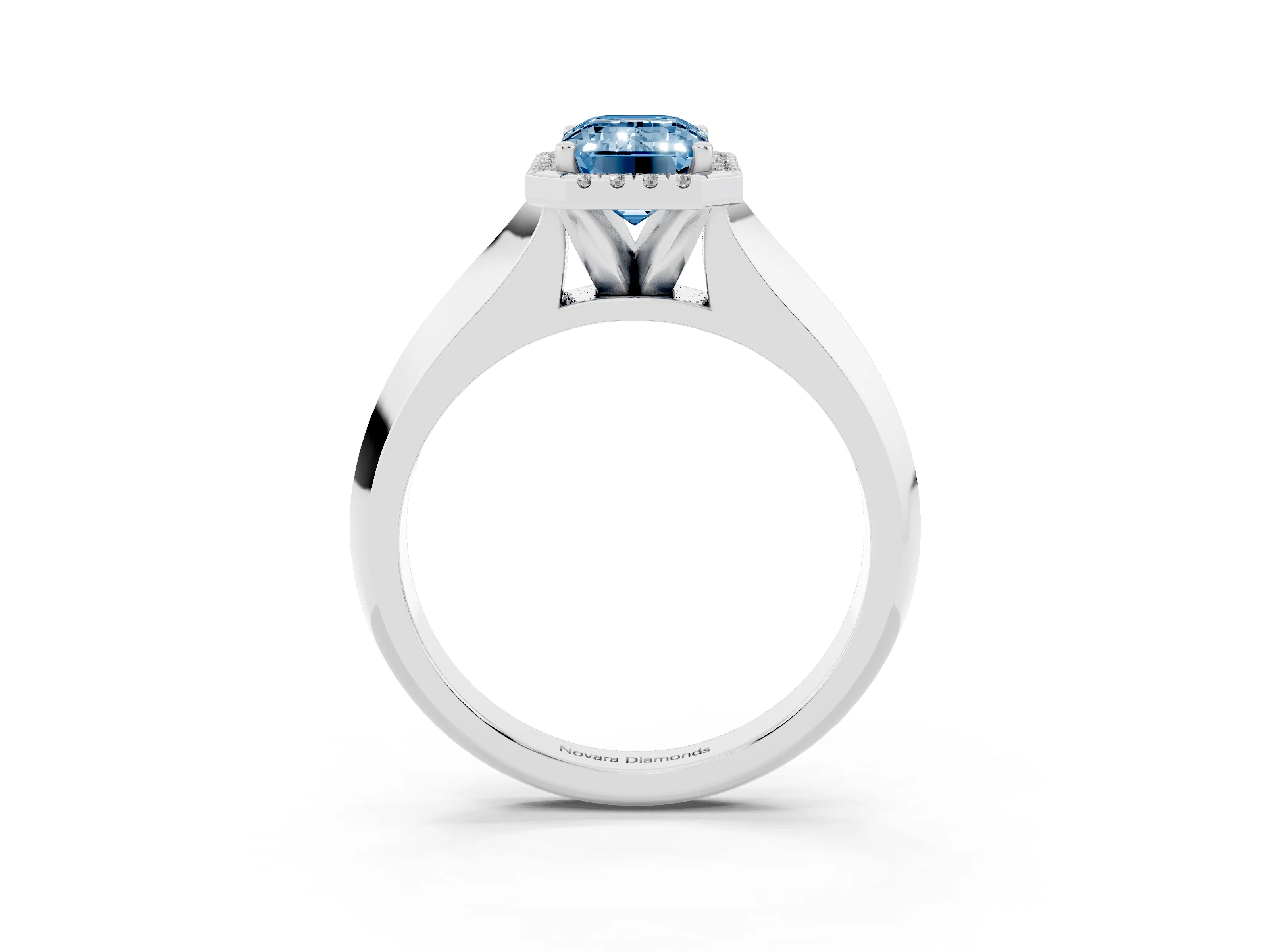 Fancy Blue Emerald Cut Diamond Halo Ring Set in White gold with Cathedral Band and Prong Setting
