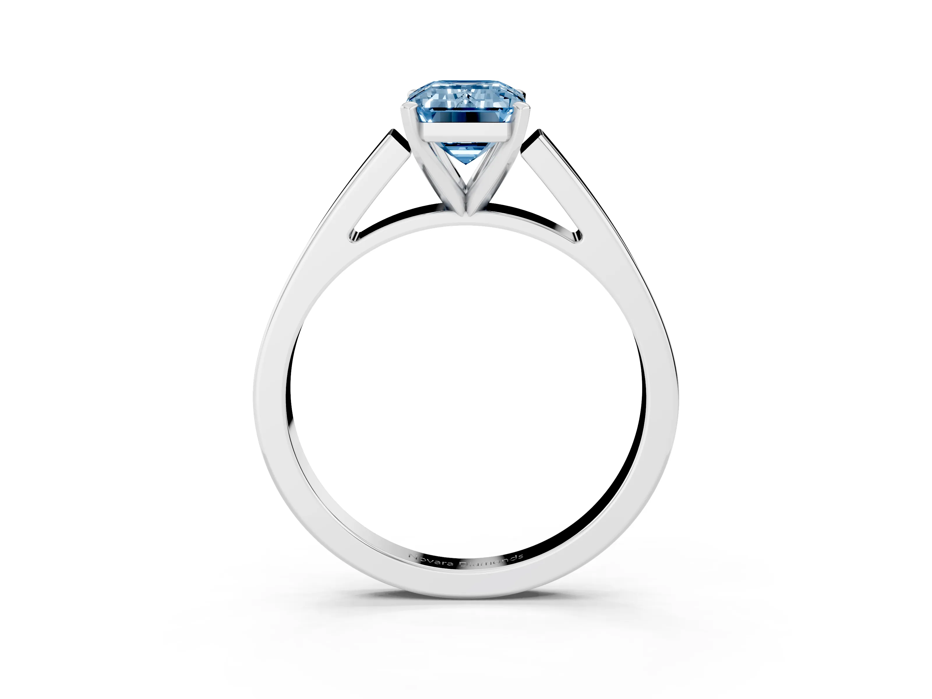 Fancy Blue Emerald Cut Diamond Solitaire Engagement Ring Set in White gold with Prong Setting and Tapered Band