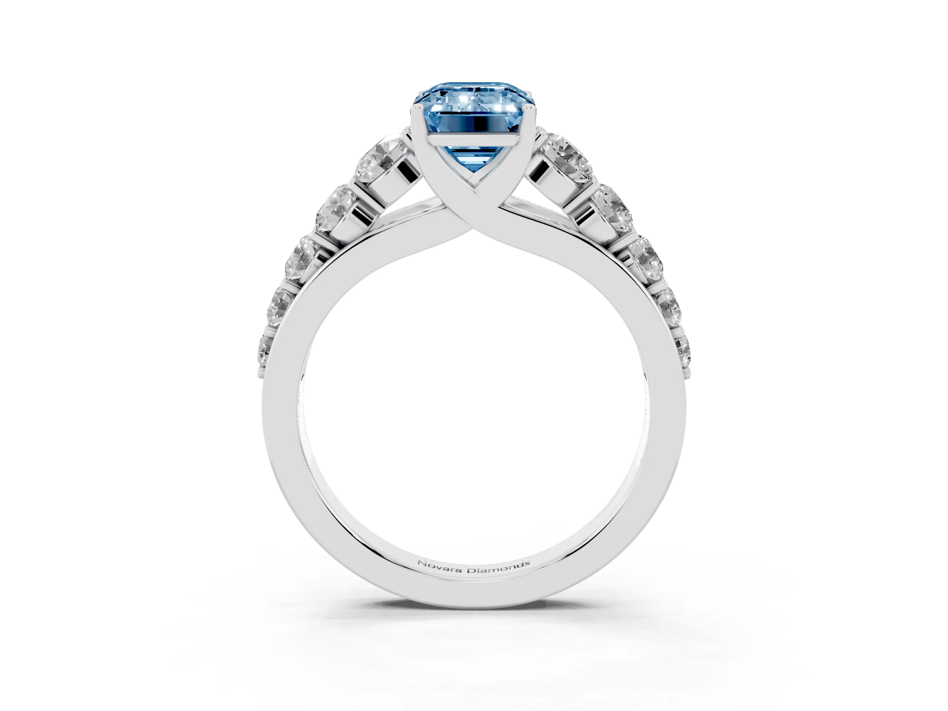Fancy Blue Emerald Cut Diamond Solitaire Ring Set in White gold with Pavé-Set Band and Prong Setting