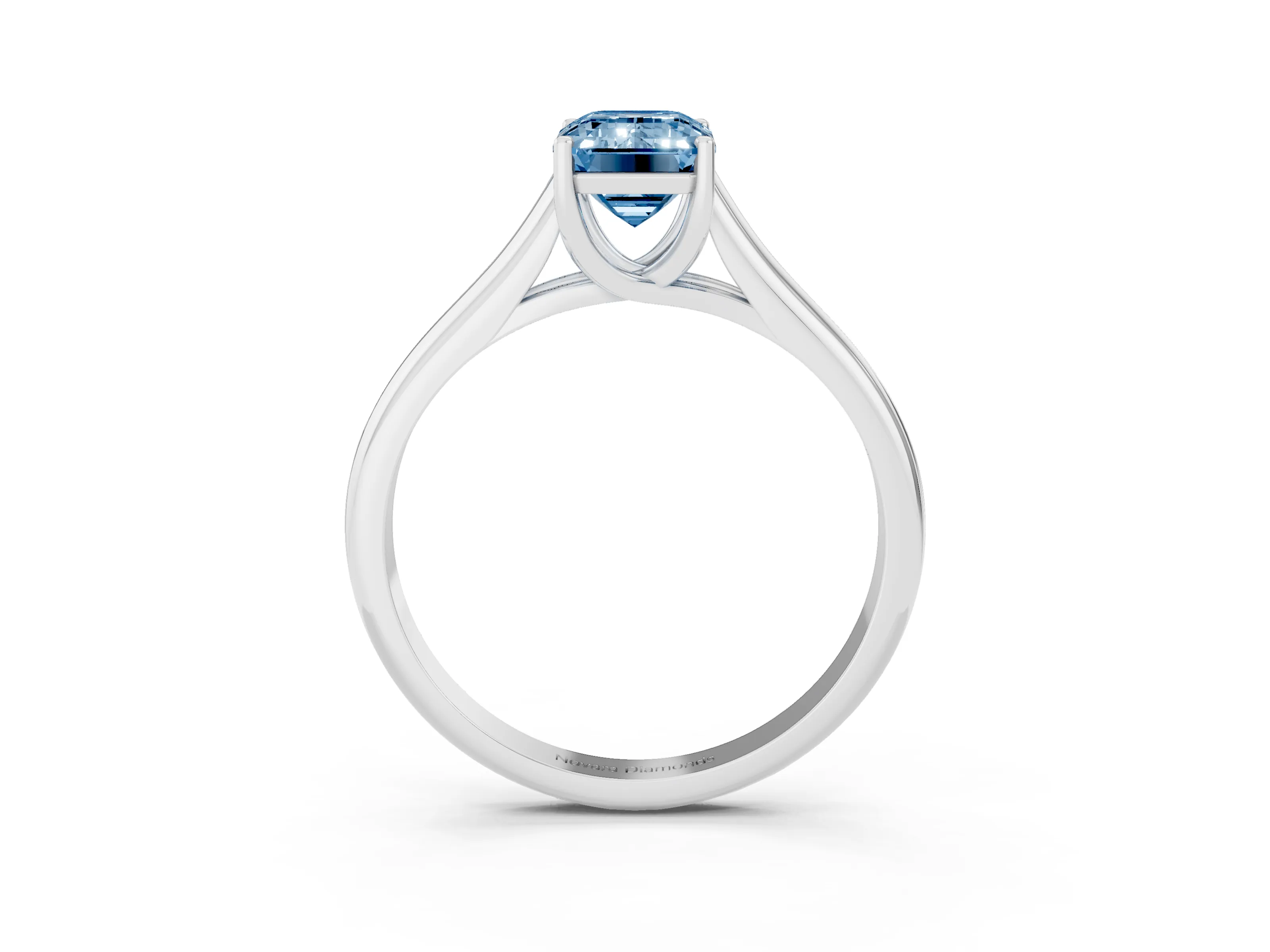 Fancy Blue Emerald Cut Diamond Solitaire Engagement Ring Set in White gold with Subtly Tapered Band and Prong Setting