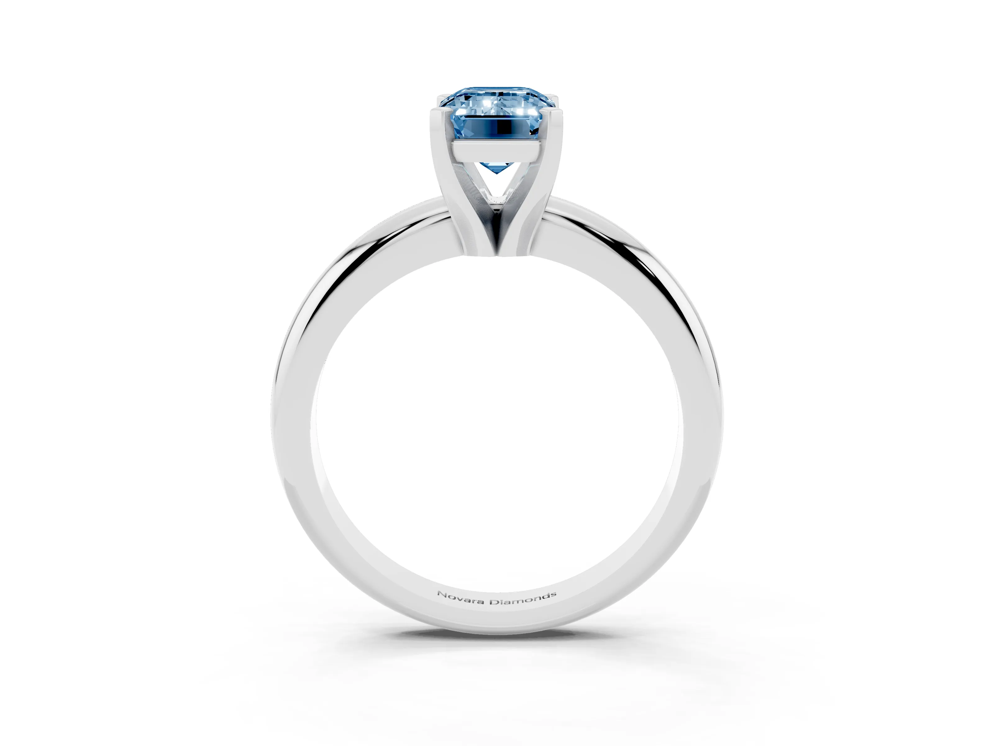 Fancy Blue Emerald Cut Diamond Solitaire Engagement Ring Set in Platinum with Round Band and Prong Setting