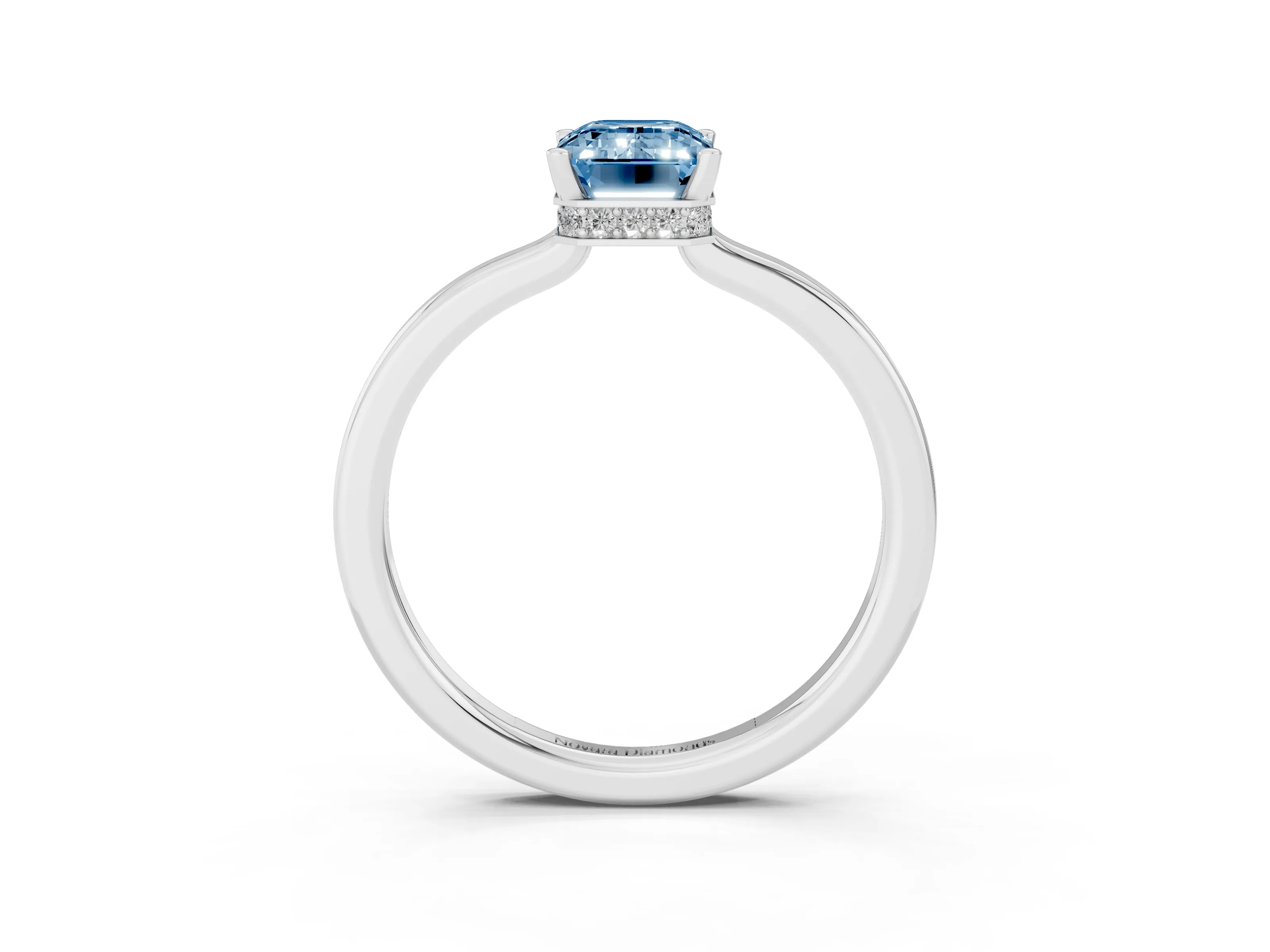 Fancy Blue Emerald Cut Diamond Solitaire Engagement Ring Set in Platinum with Prong Setting on a Plain Band