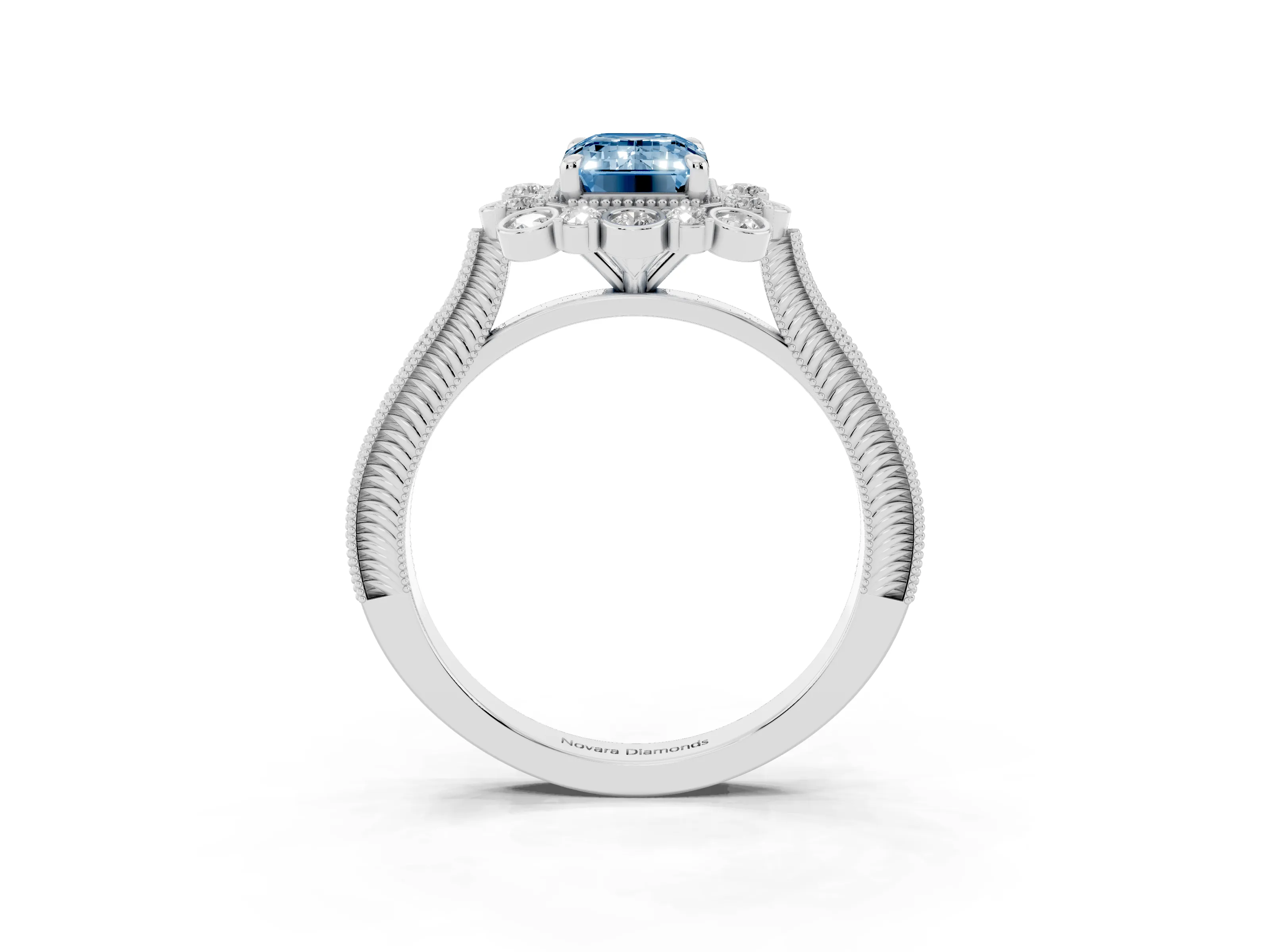 Fancy Blue Emerald Cut Diamond Halo Milgrain Pavé Ring Set in White gold with Prong Setting