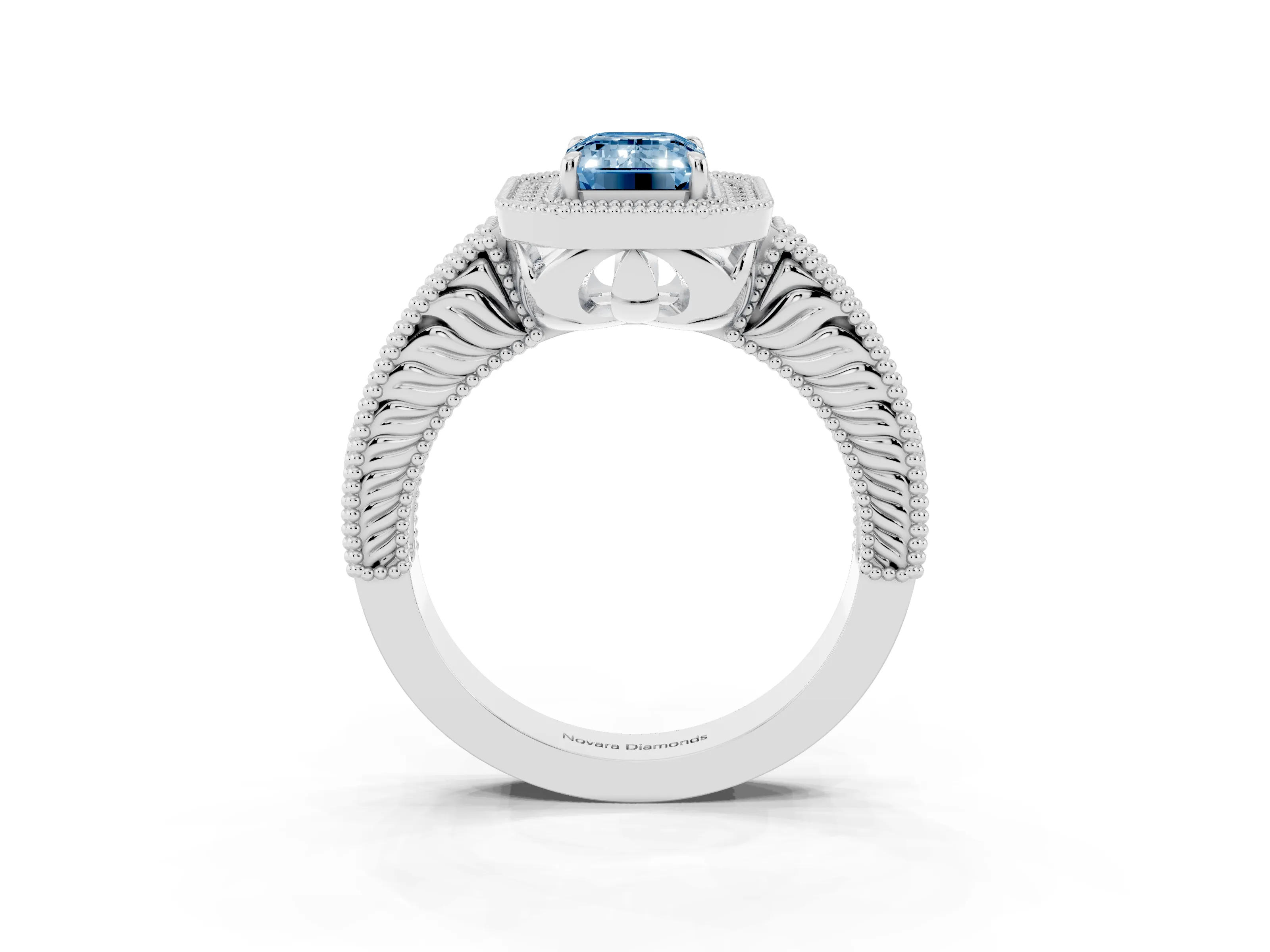 Fancy Blue Emerald Cut Diamond Halo Ring Set in White gold with Round Accent Halo, Pavé Band and Prong Setting