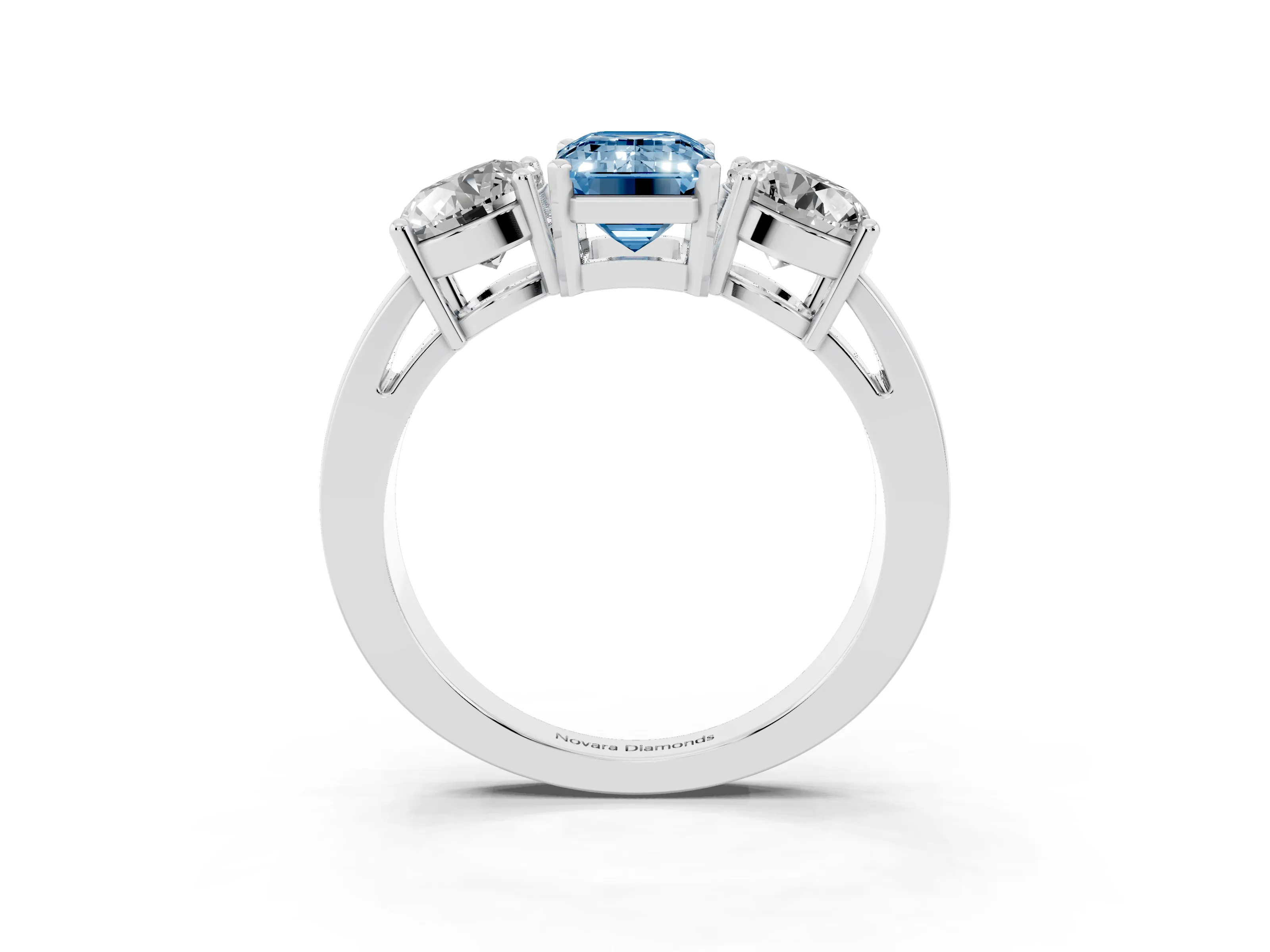 Fancy Blue Emerald Cut Diamond Three-Stone Ring Set in Platinum with Round Side Stones and Classic Band