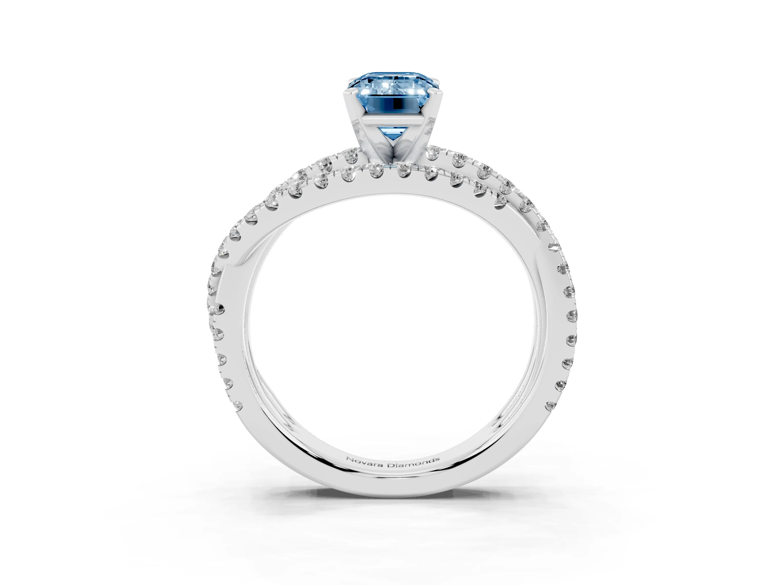 Fancy Blue Emerald Cut Diamond Solitaire Twist Band Ring Set in White gold with Pavé Setting and Prong Head