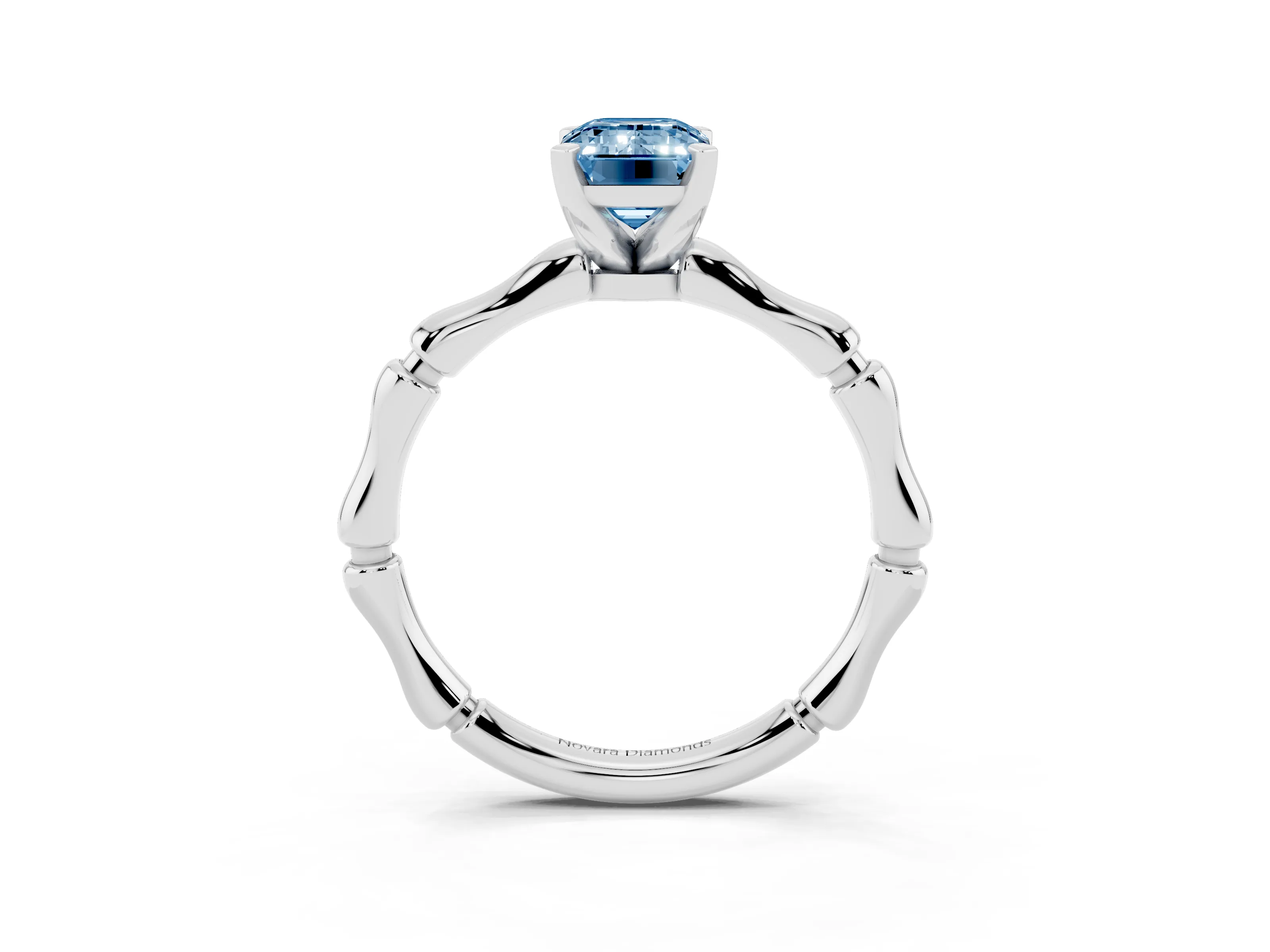 Fancy Blue Emerald Cut Diamond Solitaire Ring Set in Silver with Bamboo Band and Prong Setting
